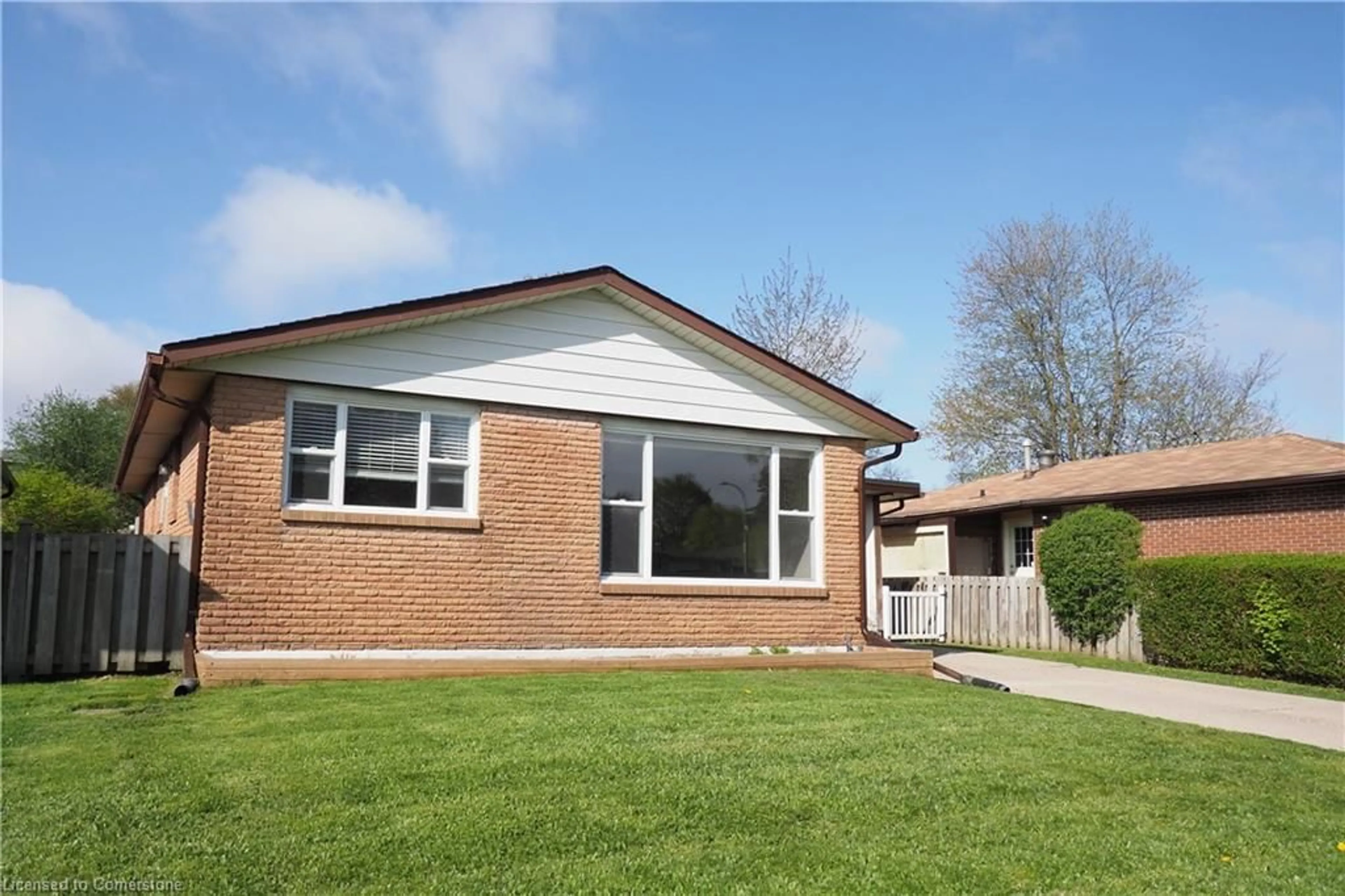 Home with brick exterior material, street for 39 Markwood Dr, Kitchener Ontario N2M 2H3