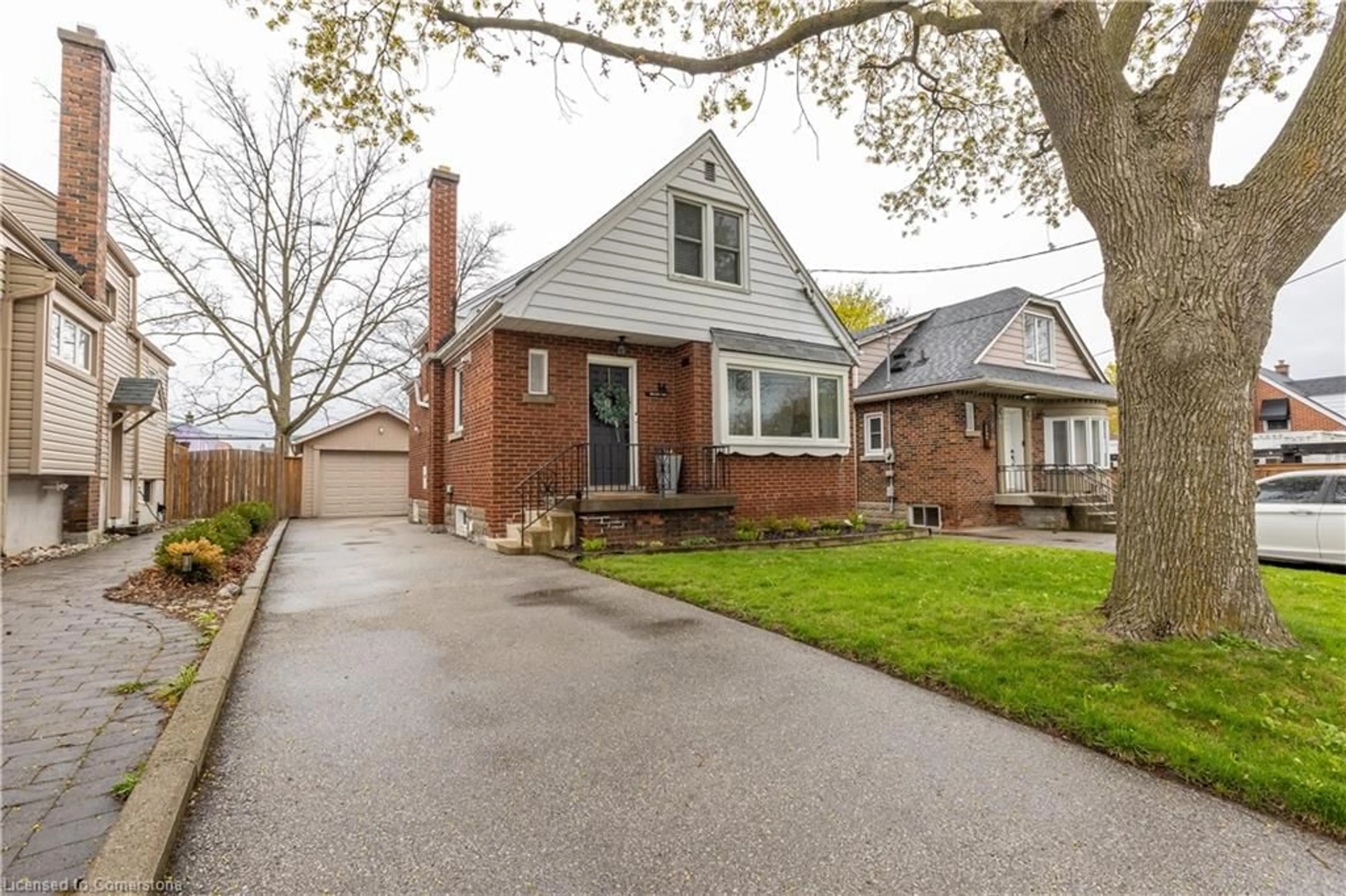 Home with brick exterior material, street for 16 Millen Ave, Hamilton Ontario L9A 2T4