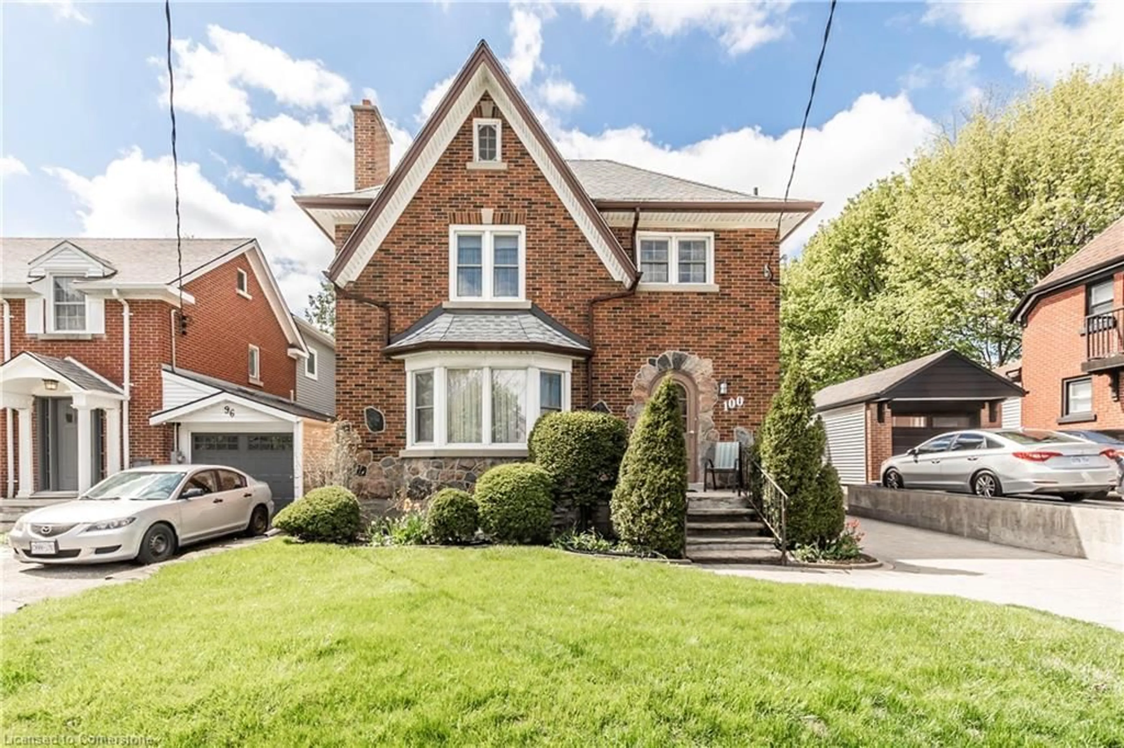 Home with brick exterior material, street for 100 Borden Ave, Kitchener Ontario N2H 3J4
