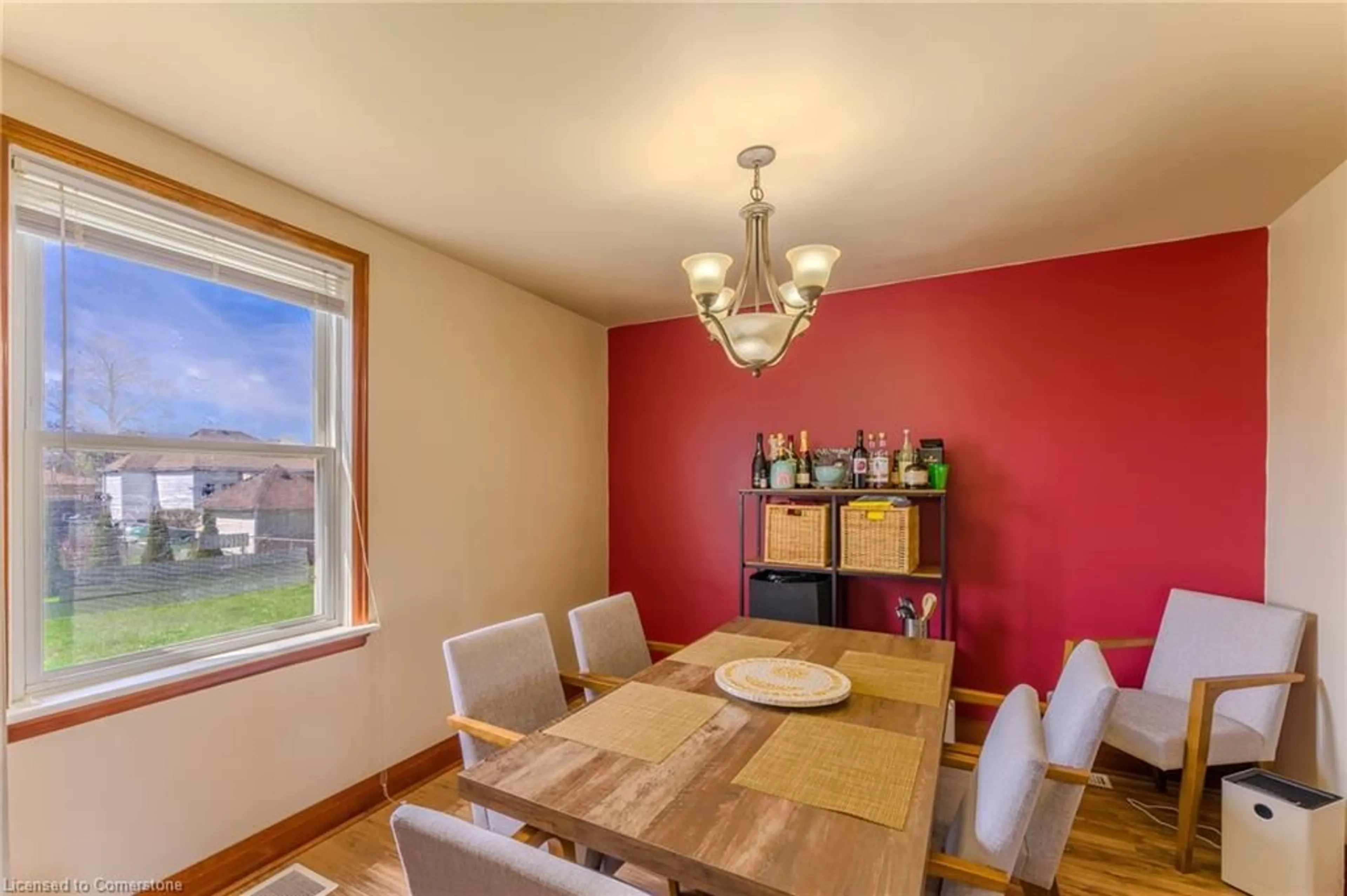 Dining room, wood/laminate floor for 120 Howard Ave, Hamilton Ontario L9A 2W7