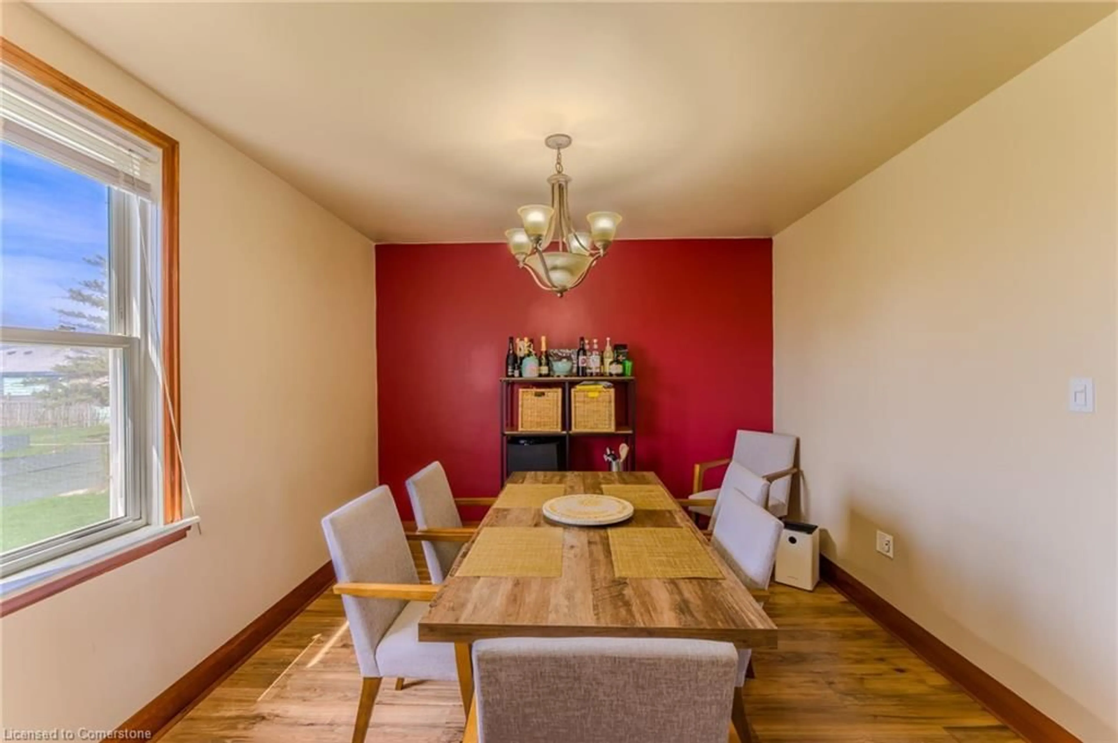 Dining room, wood/laminate floor for 120 Howard Ave, Hamilton Ontario L9A 2W7