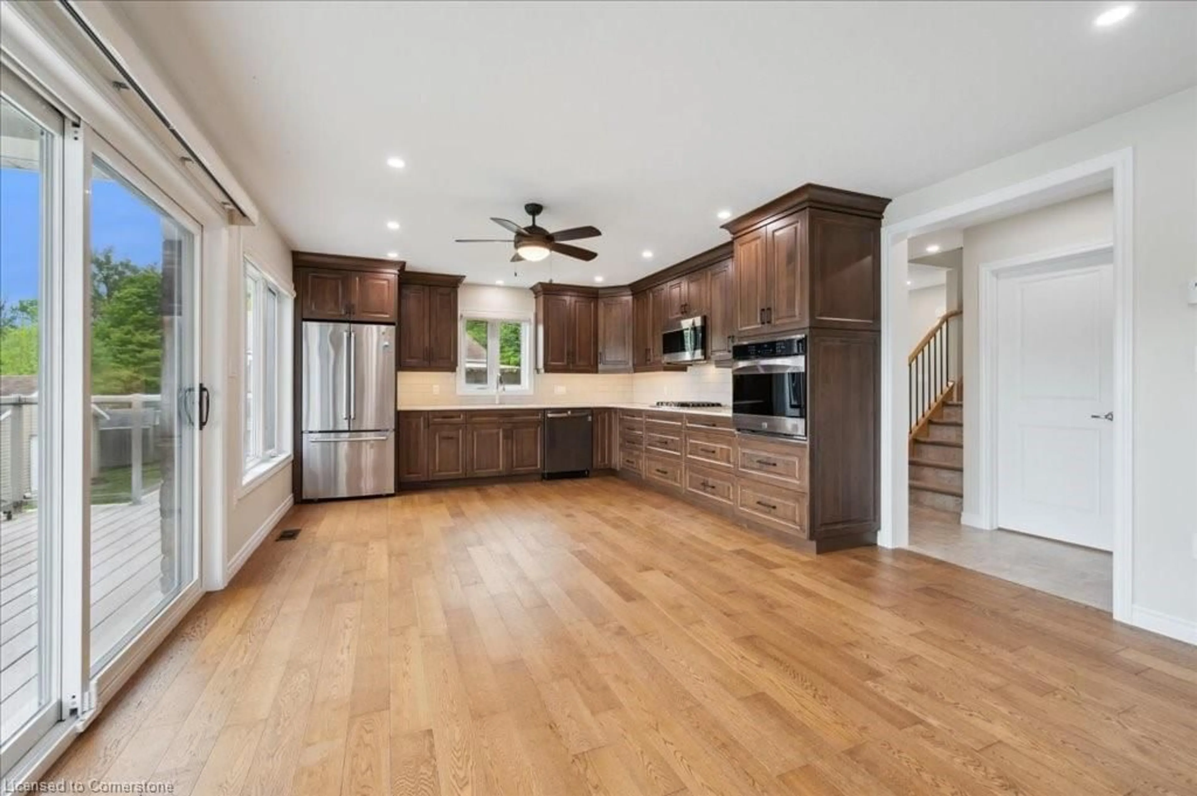 Open concept kitchen, wood/laminate floor for 493 Lake Rosalind Rd 4, Hanover Ontario N4N 3B9