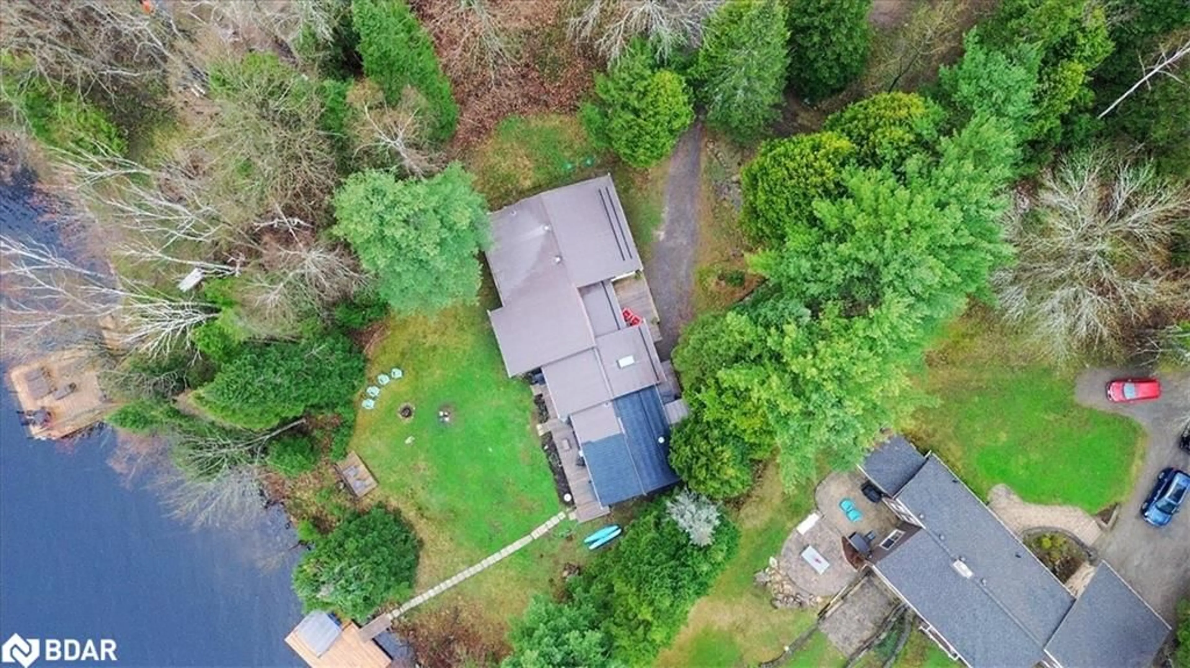 A pic from outside/outdoor area/front of a property/back of a property/a pic from drone, street for 1017 Rays Lane, Minden Ontario K0M 2K0