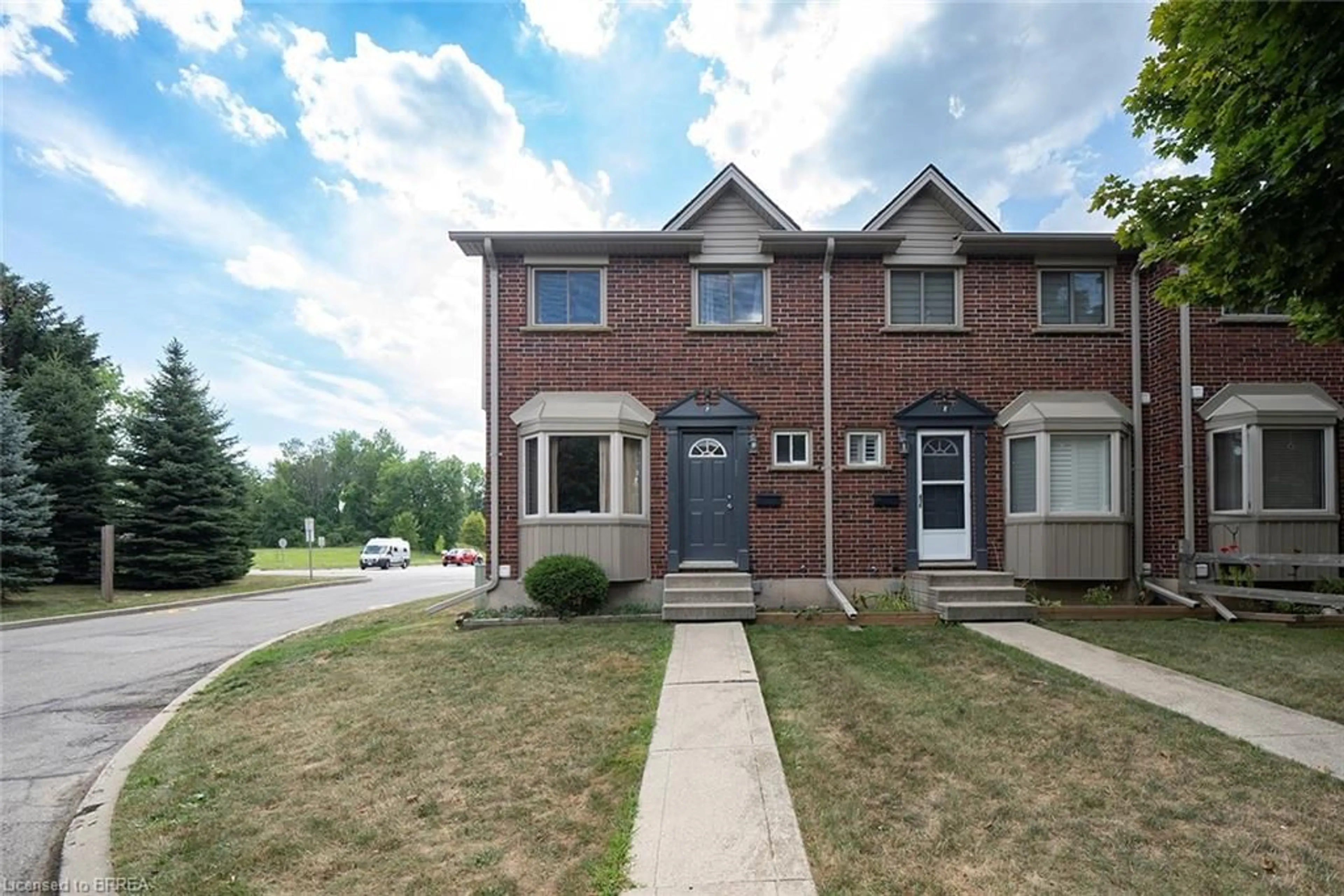 Home with brick exterior material, street for 153 Brantwood Park Rd #F, Brantford Ontario N3P 1X9
