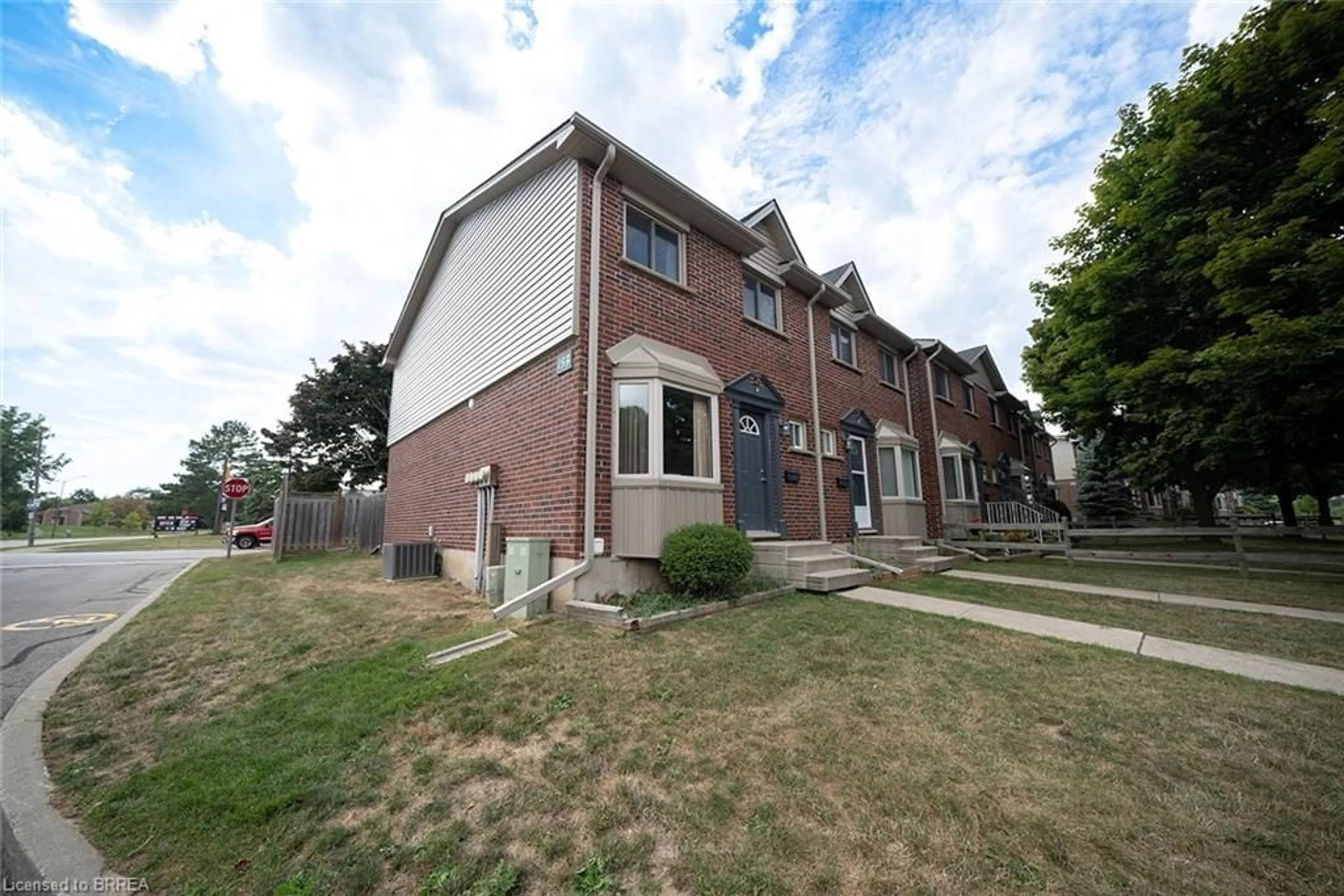 Home with brick exterior material, street for 153 Brantwood Park Rd #F, Brantford Ontario N3P 1X9