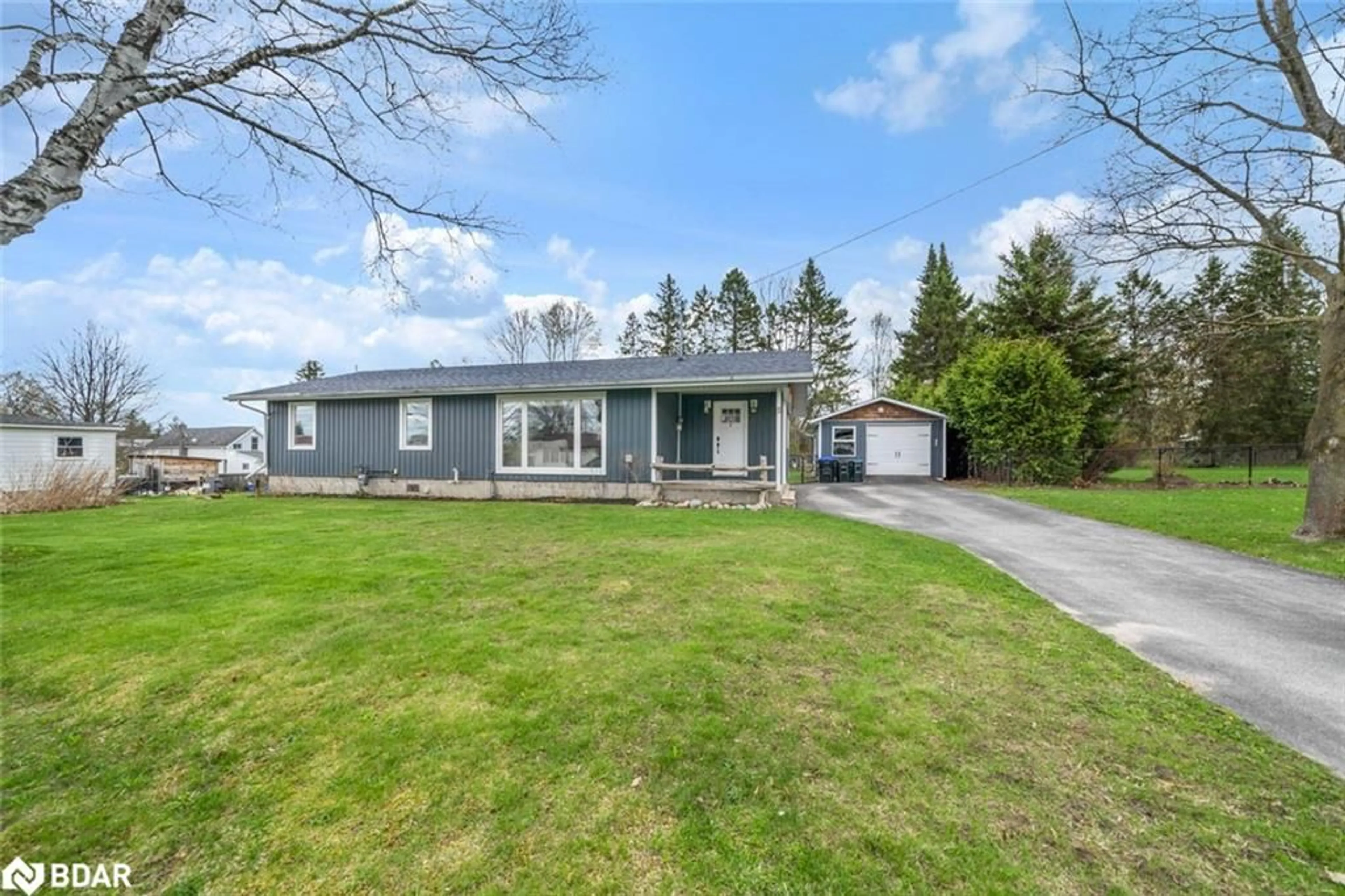 A pic from outside/outdoor area/front of a property/back of a property/a pic from drone, street for 11 Albert St, Springwater Ontario L0L 1V0
