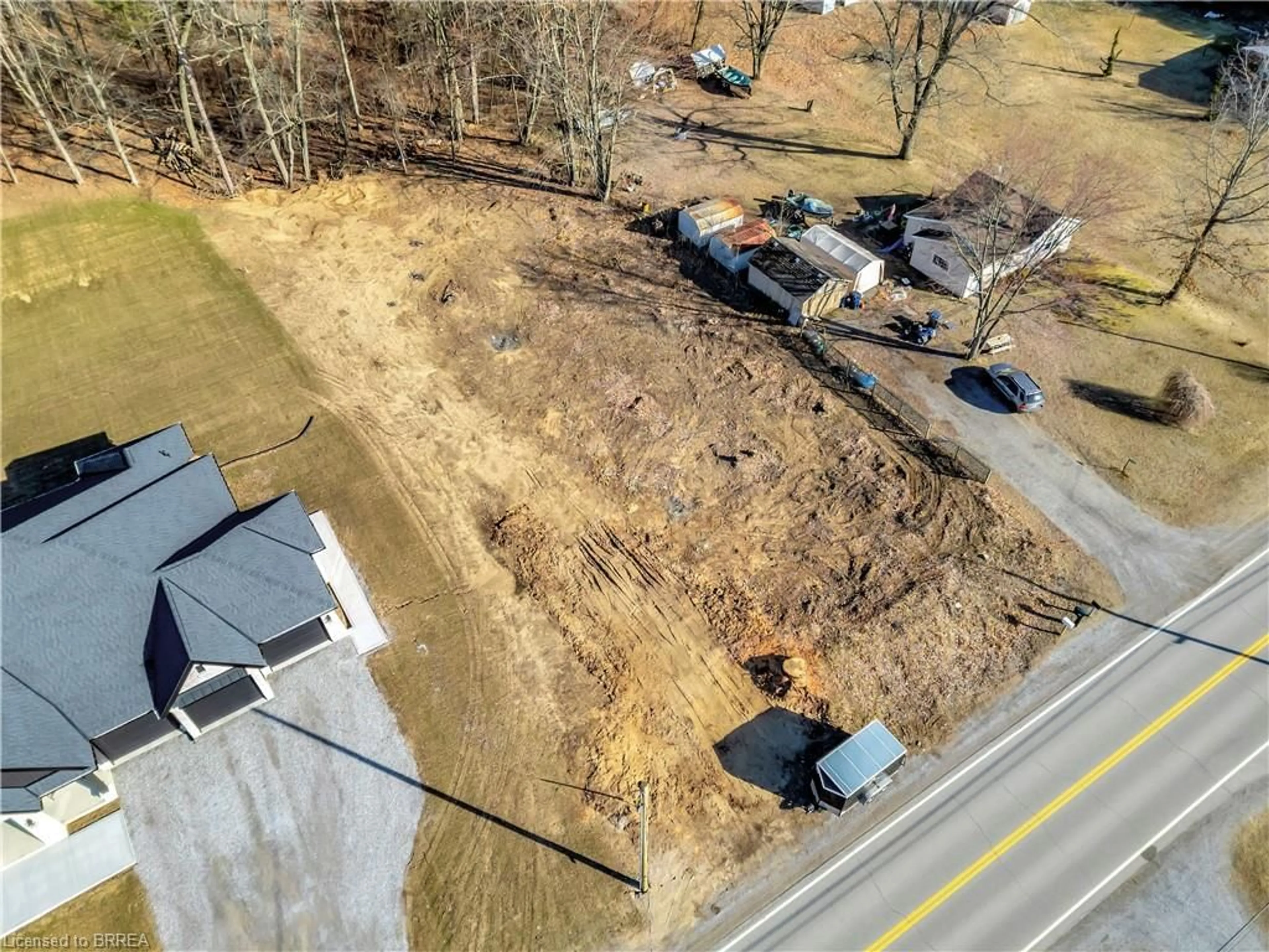 A pic from outside/outdoor area/front of a property/back of a property/a pic from drone, street for 1021 Norfolk County Road 21, Norfolk Ontario N4B 2W4