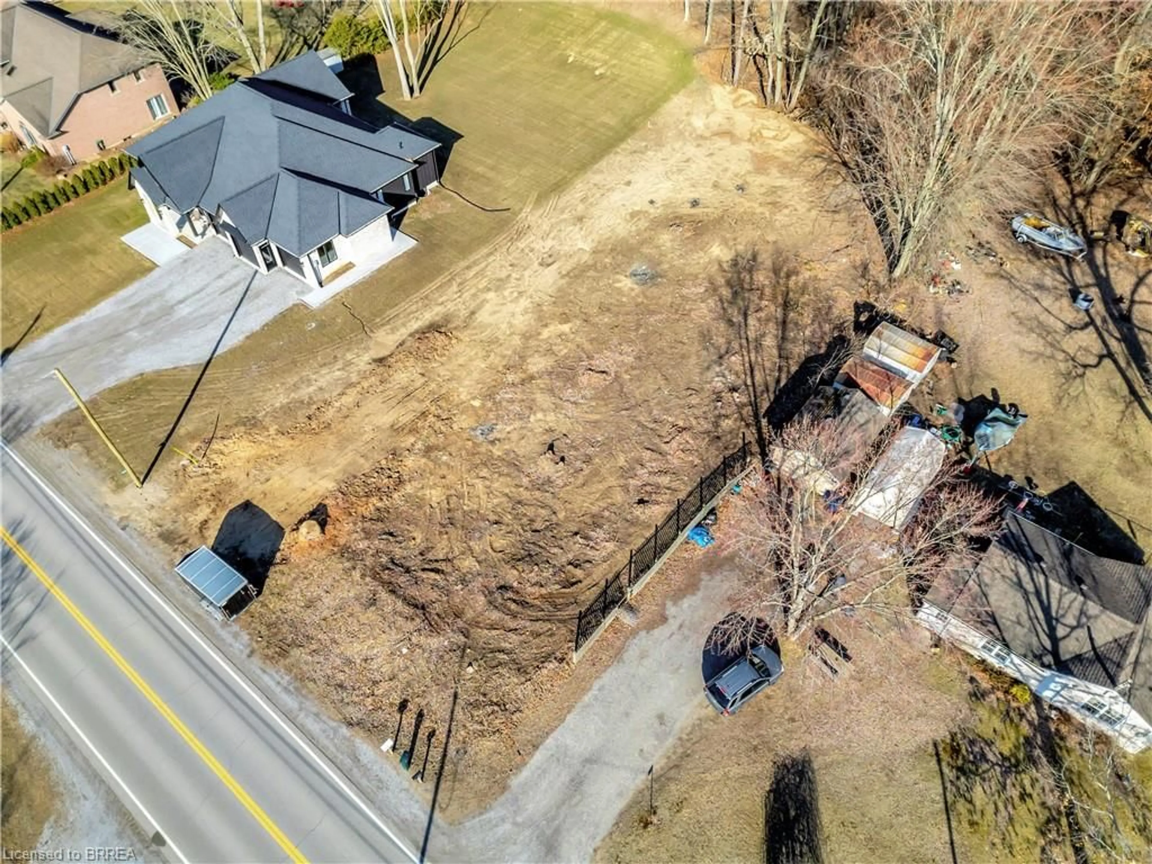 A pic from outside/outdoor area/front of a property/back of a property/a pic from drone, street for 1021 Norfolk County Road 21, Norfolk Ontario N4B 2W4