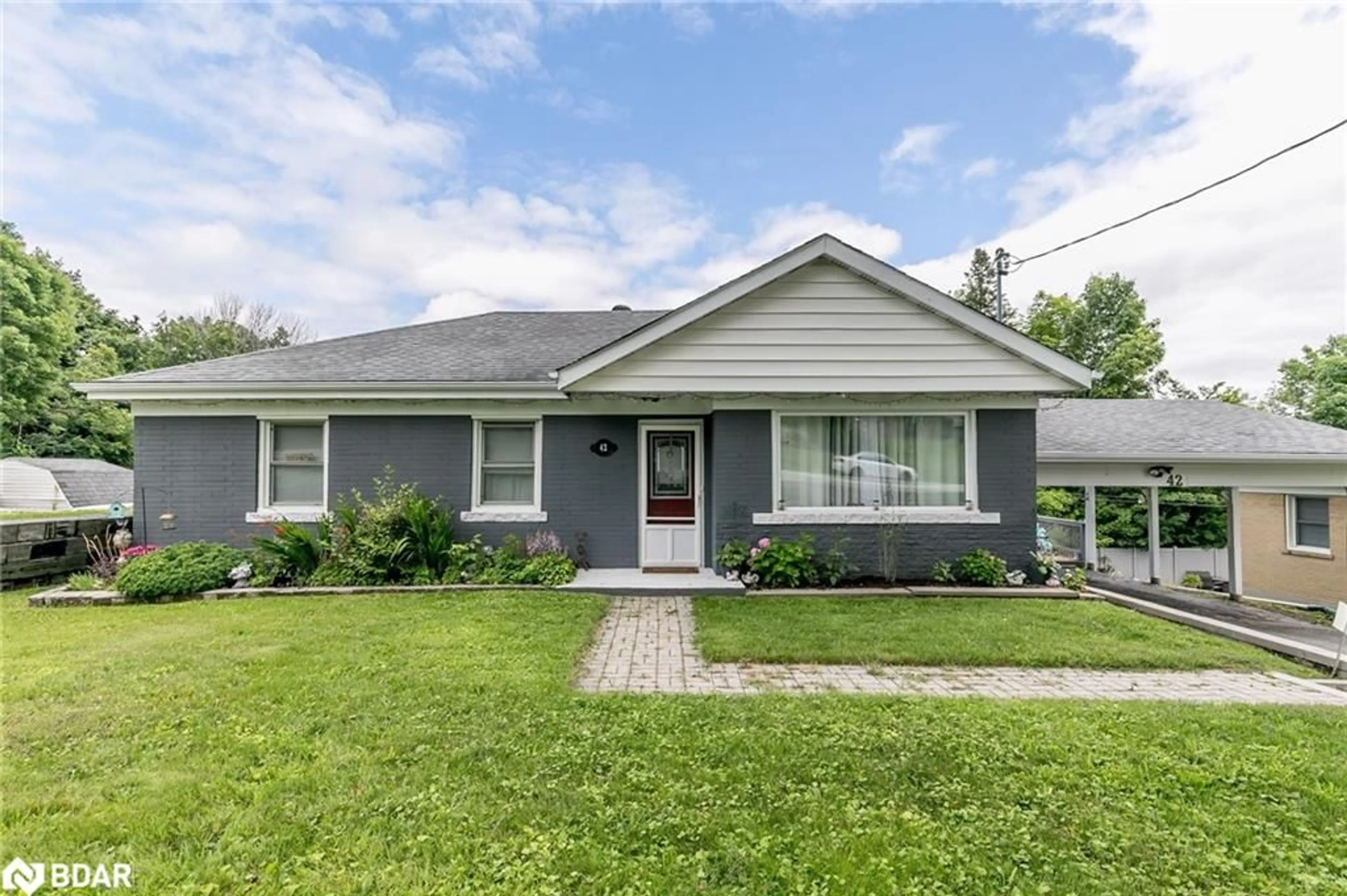 Home with vinyl exterior material, street for 42 Charles Rd, Orillia Ontario L3V 3H4