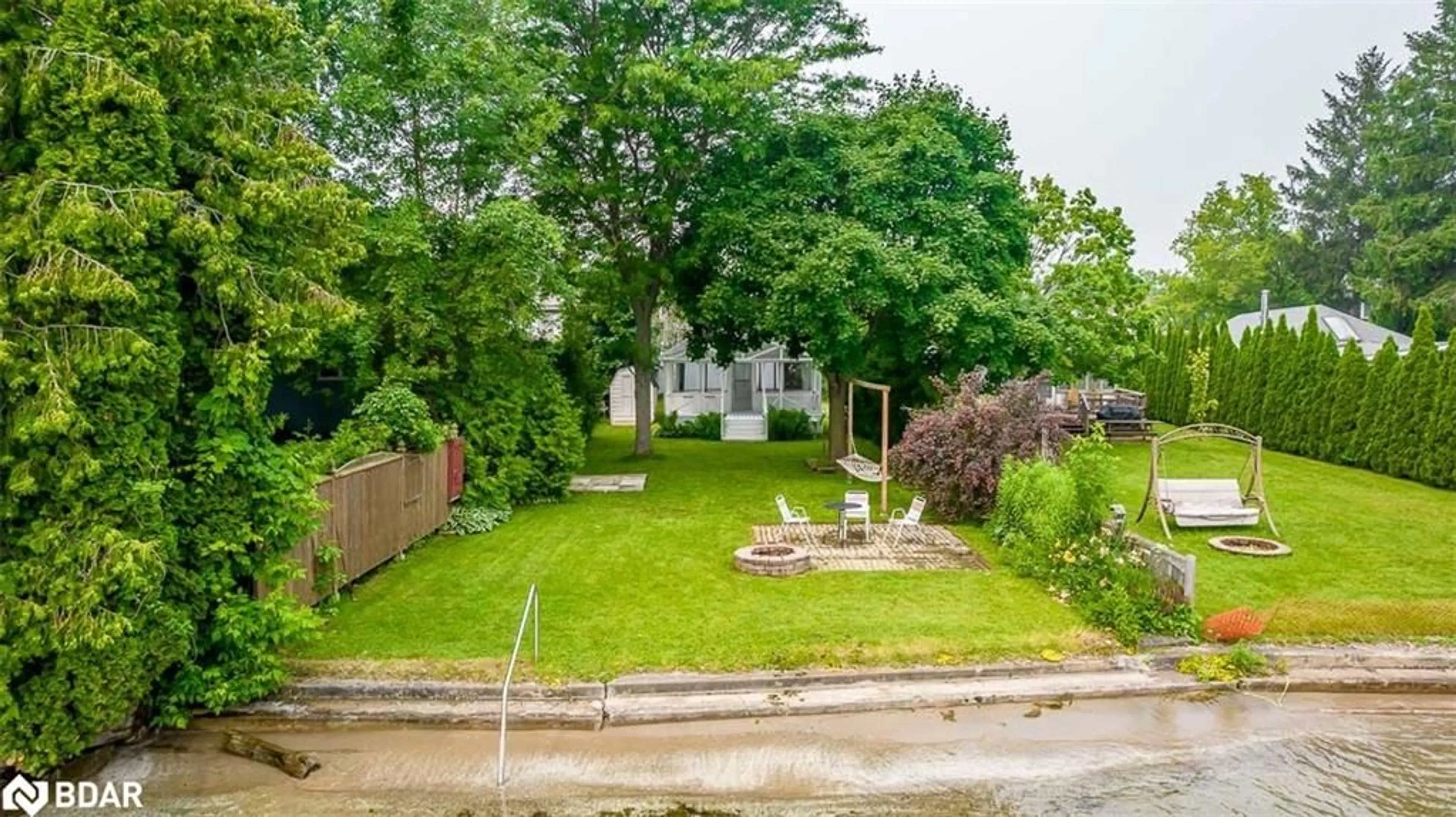 A pic from outside/outdoor area/front of a property/back of a property/a pic from drone, street for 1283 Maple Rd, Innisfil Ontario L0L 1R0