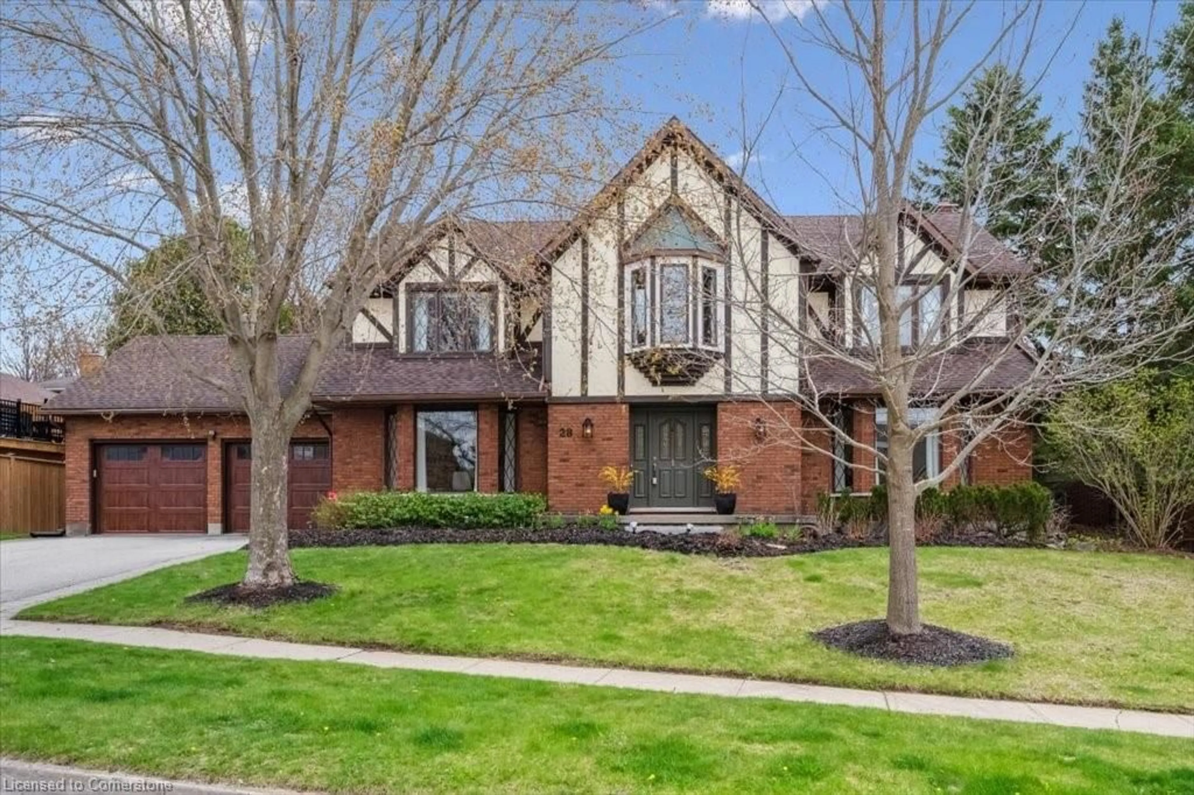 Home with brick exterior material, street for 28 Valleyridge Trail, Guelph Ontario N1G 4B3