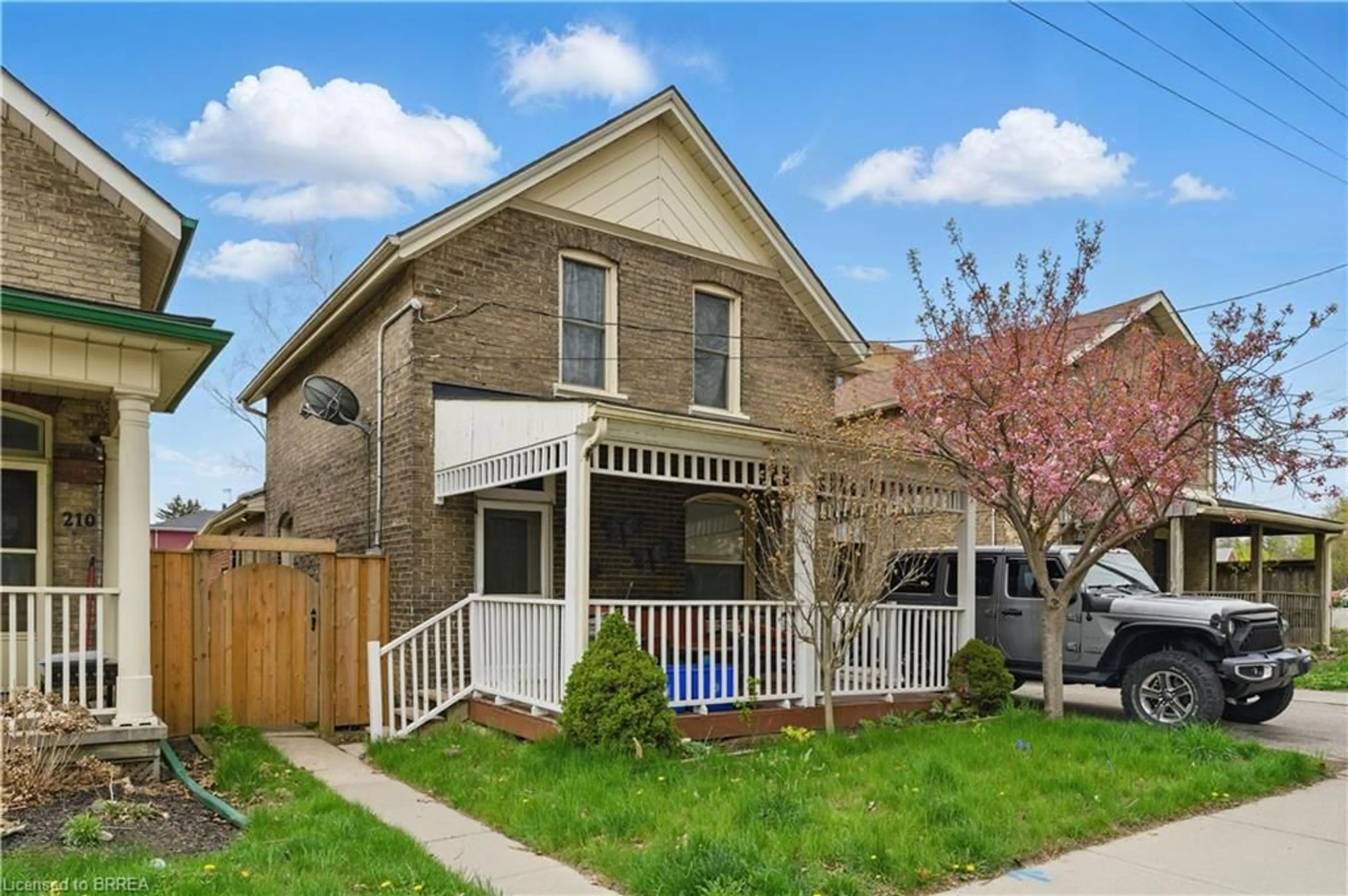 Home with brick exterior material, street for 212 William St, Brantford Ontario N3T 3L7