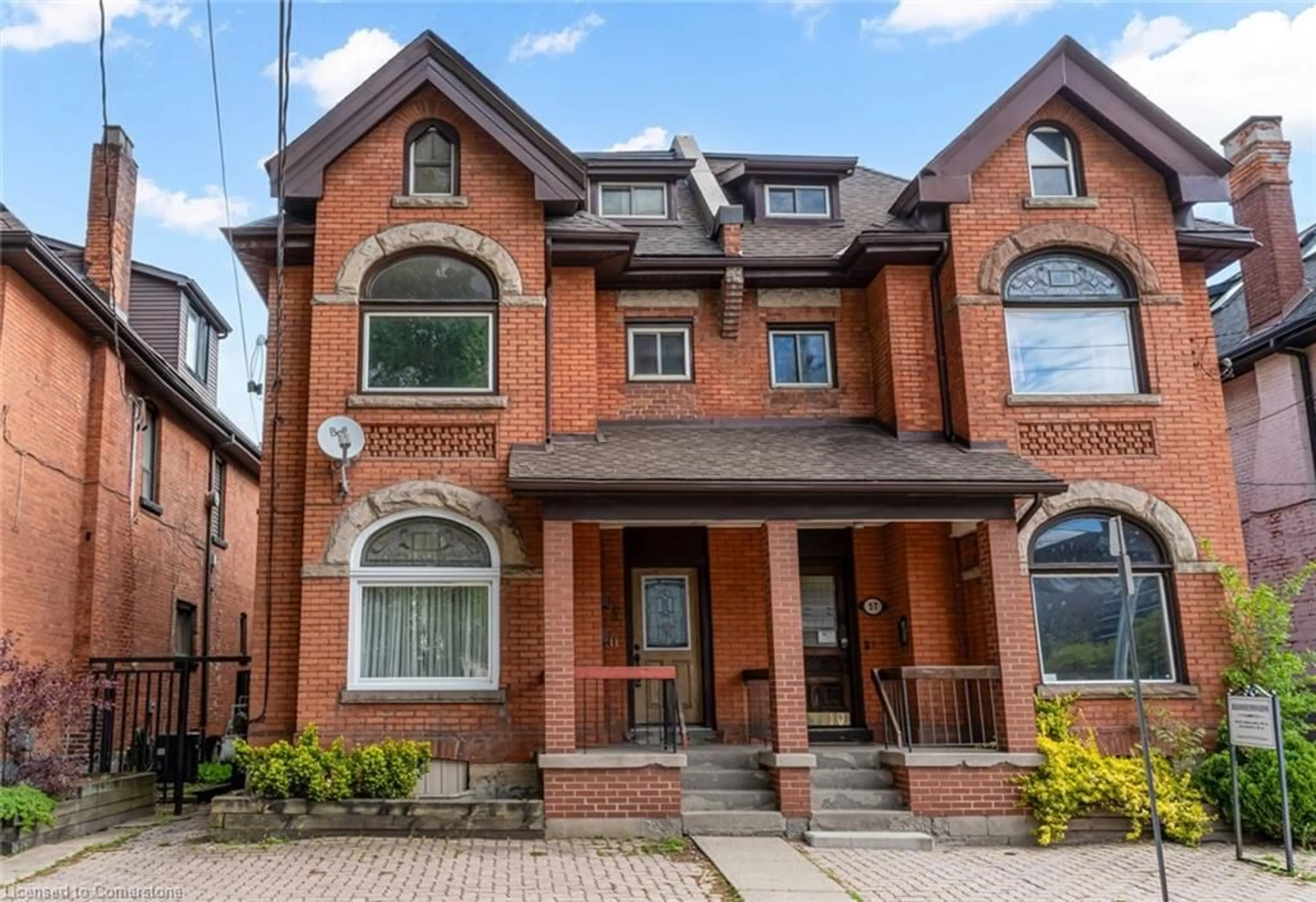 Home with brick exterior material, street for 55 Young St, Hamilton Ontario L8N 1V1