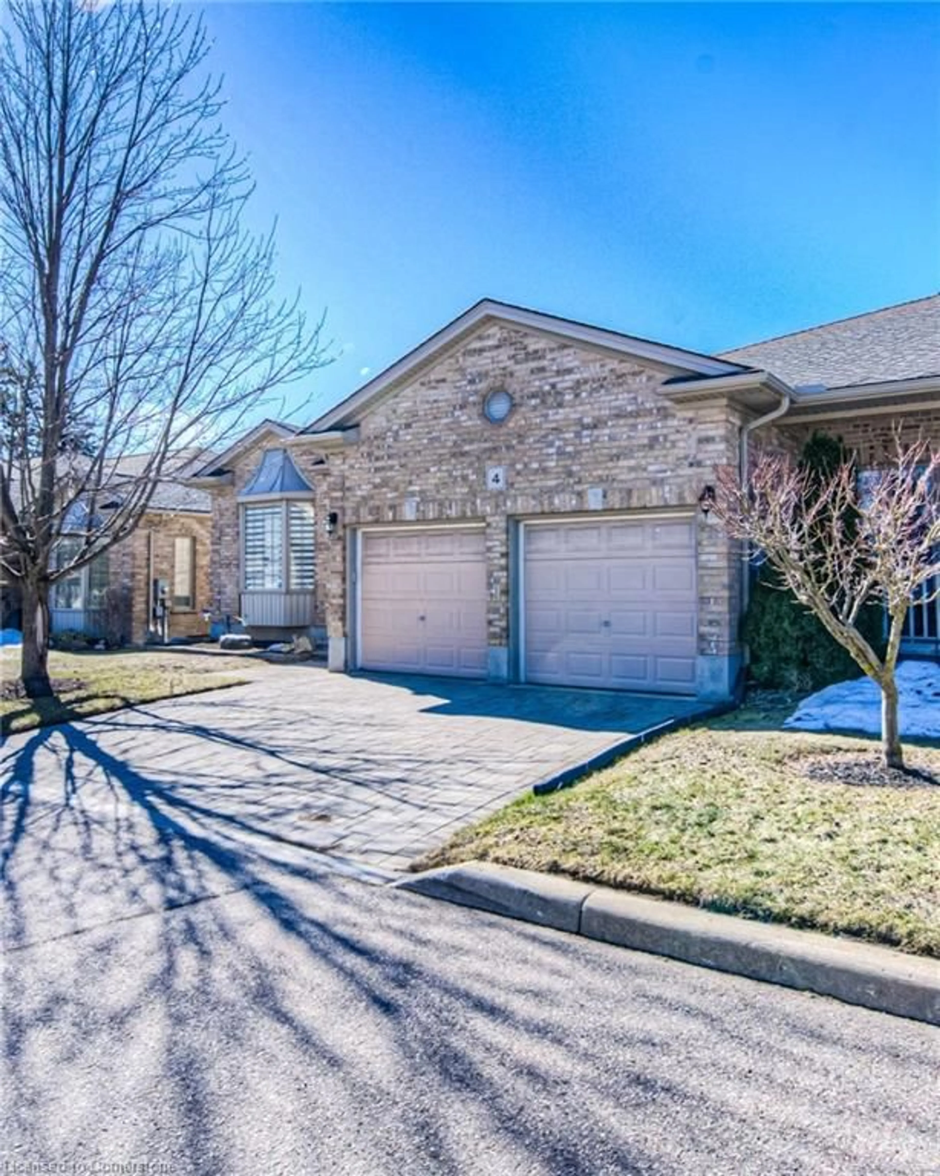 Home with brick exterior material, street for 900 Doon Village Rd #4, Kitchener Ontario N2P 1A4