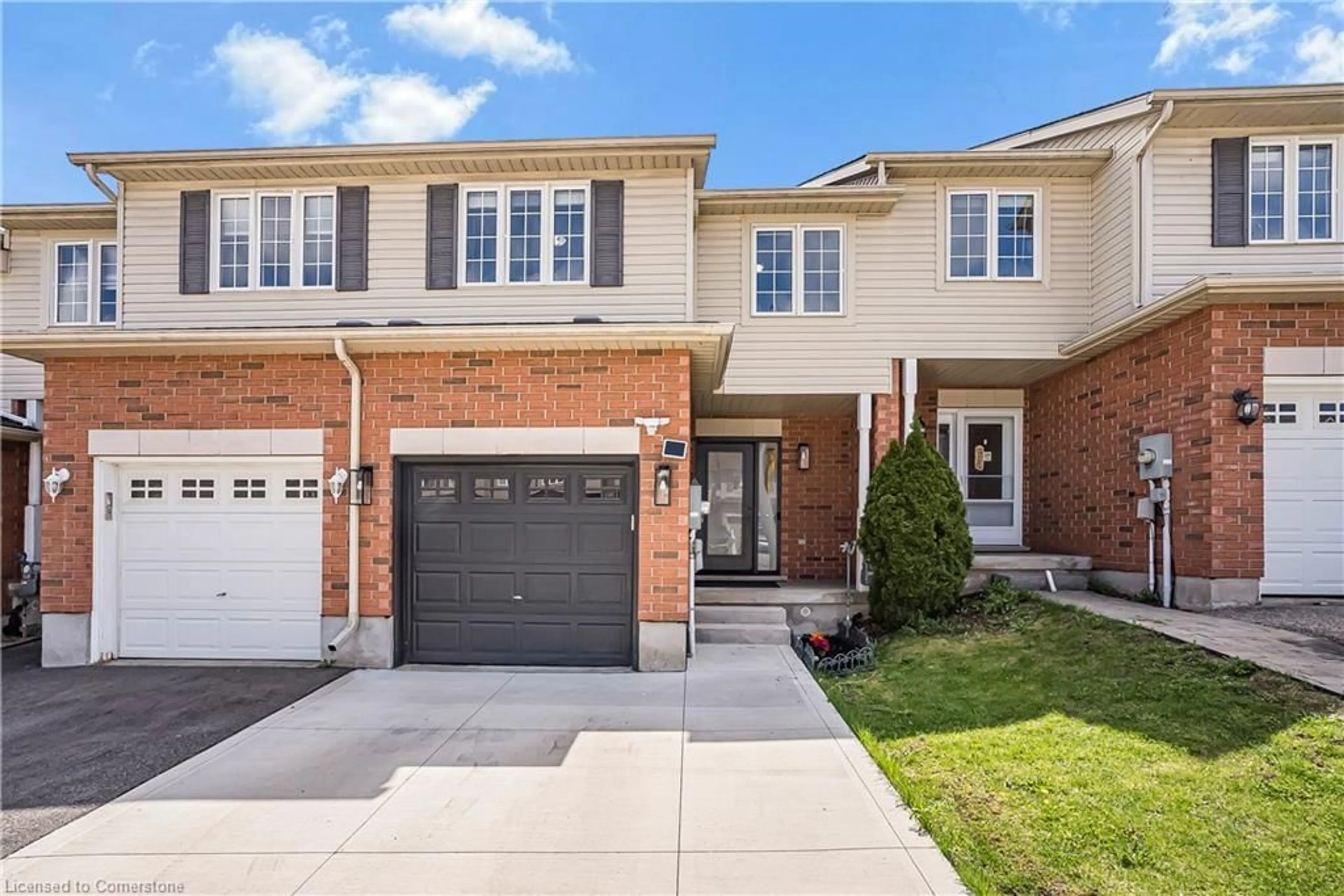 Home with brick exterior material, street for 295 Briarmeadow Dr, Kitchener Ontario N2A 4K9