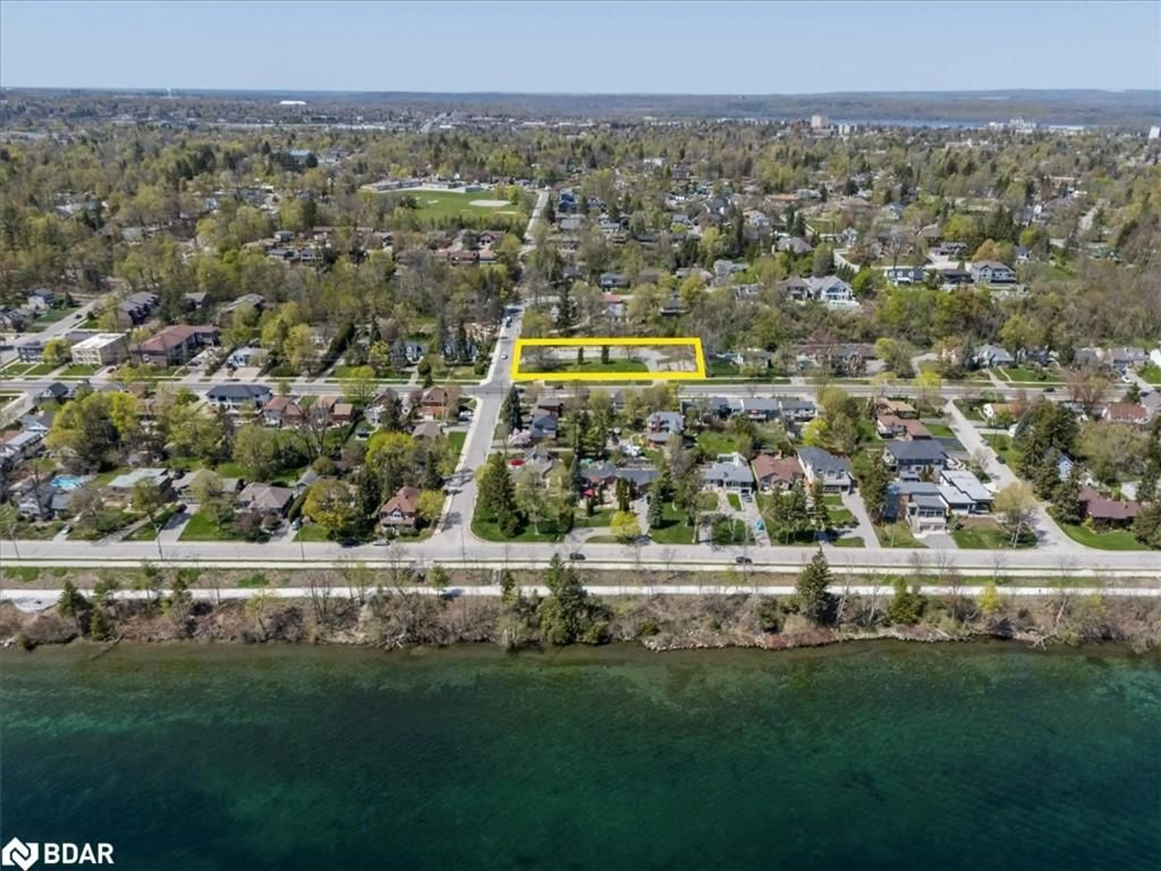 A pic from outside/outdoor area/front of a property/back of a property/a pic from drone, water/lake/river/ocean view for 114 Blake St, Barrie Ontario L4M 1K3
