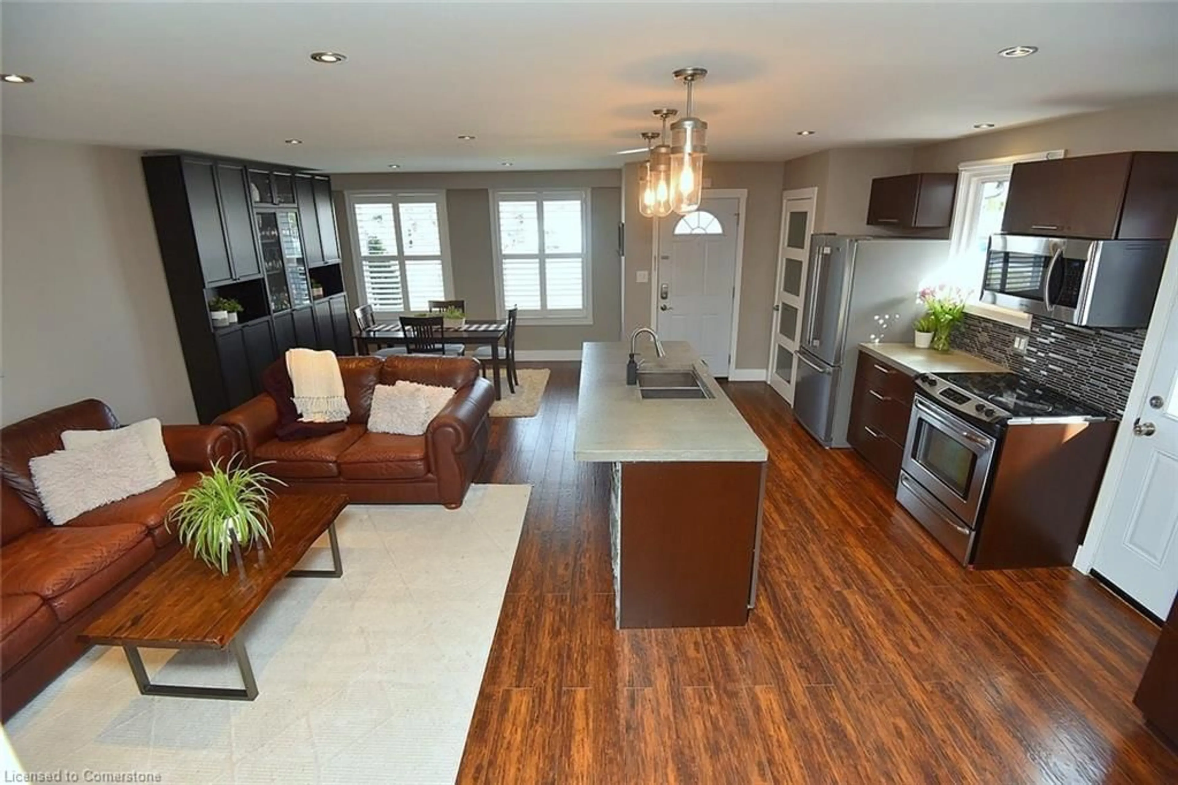 Open concept kitchen, wood/laminate floor for 614 Upper Paradise Rd, Hamilton Ontario L9C 5P6
