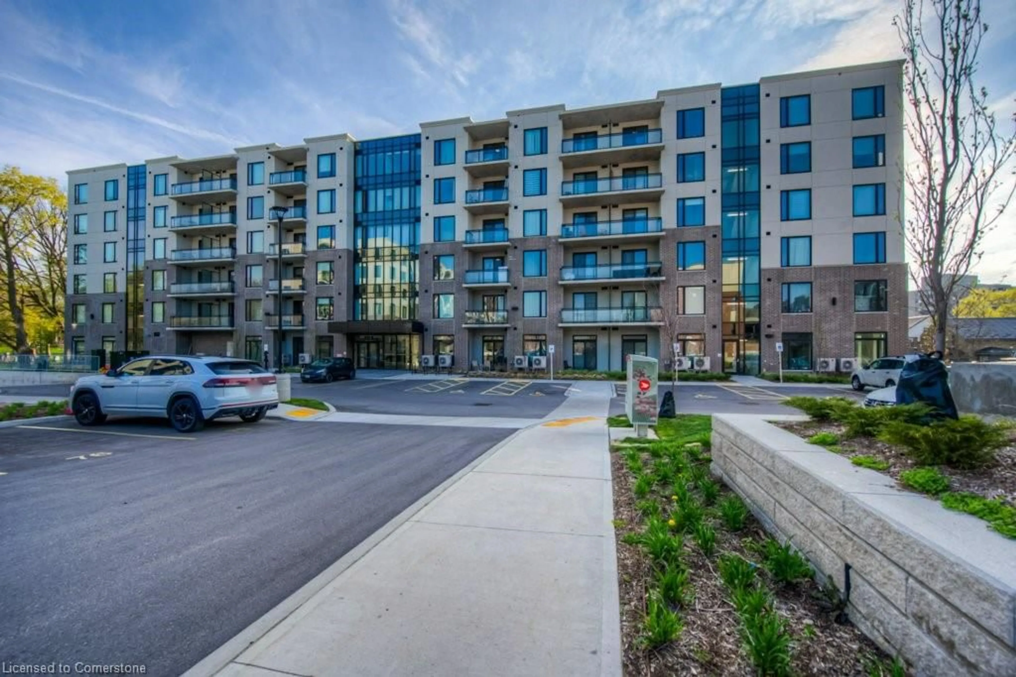 A pic from outside/outdoor area/front of a property/back of a property/a pic from drone, street for 103 Roger St #414, Waterloo Ontario N2J 0G2