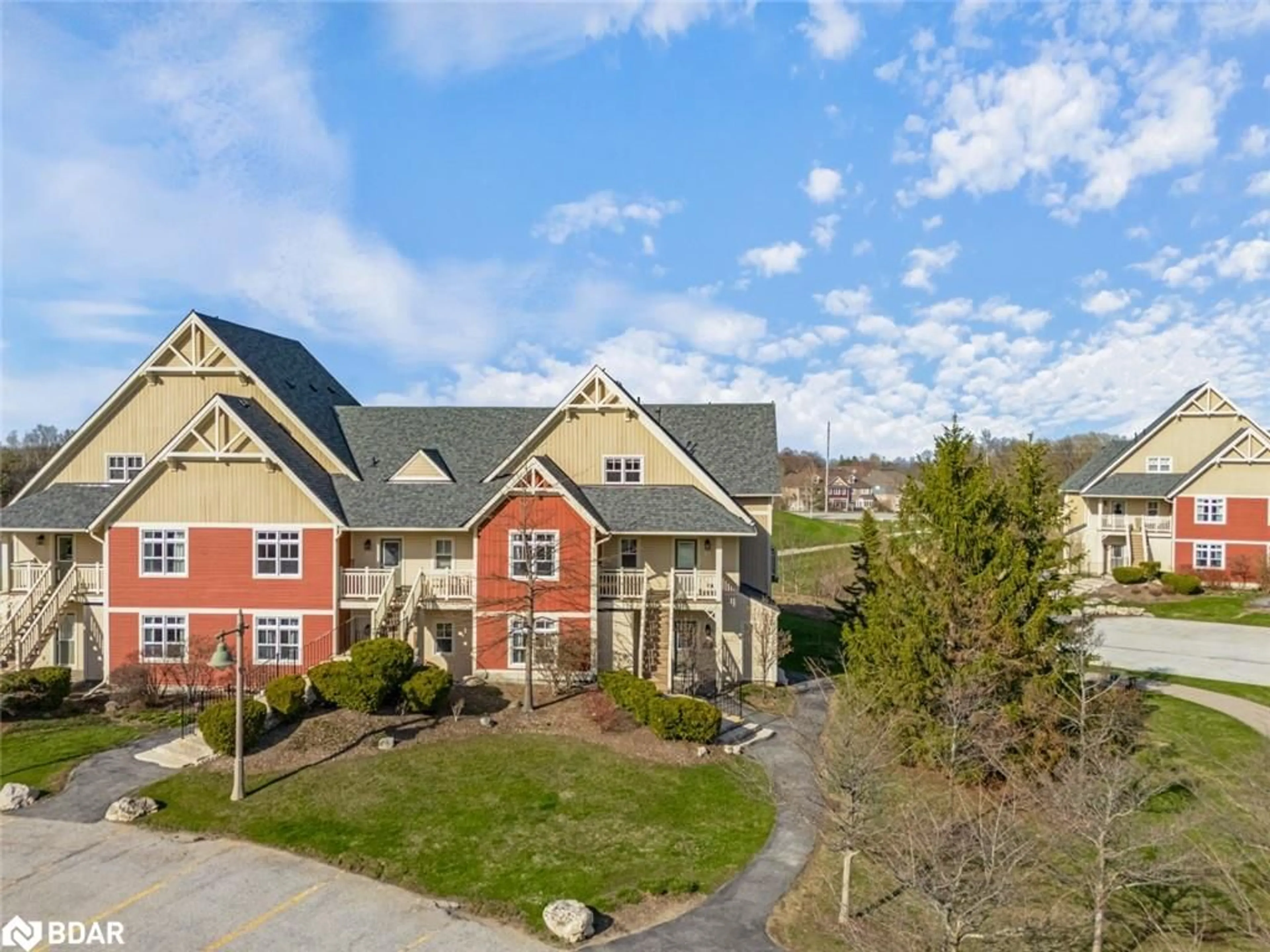 A pic from outside/outdoor area/front of a property/back of a property/a pic from drone, mountain view for 130 Fairway Court Crt #229, The Blue Mountains Ontario N3W 1Y1