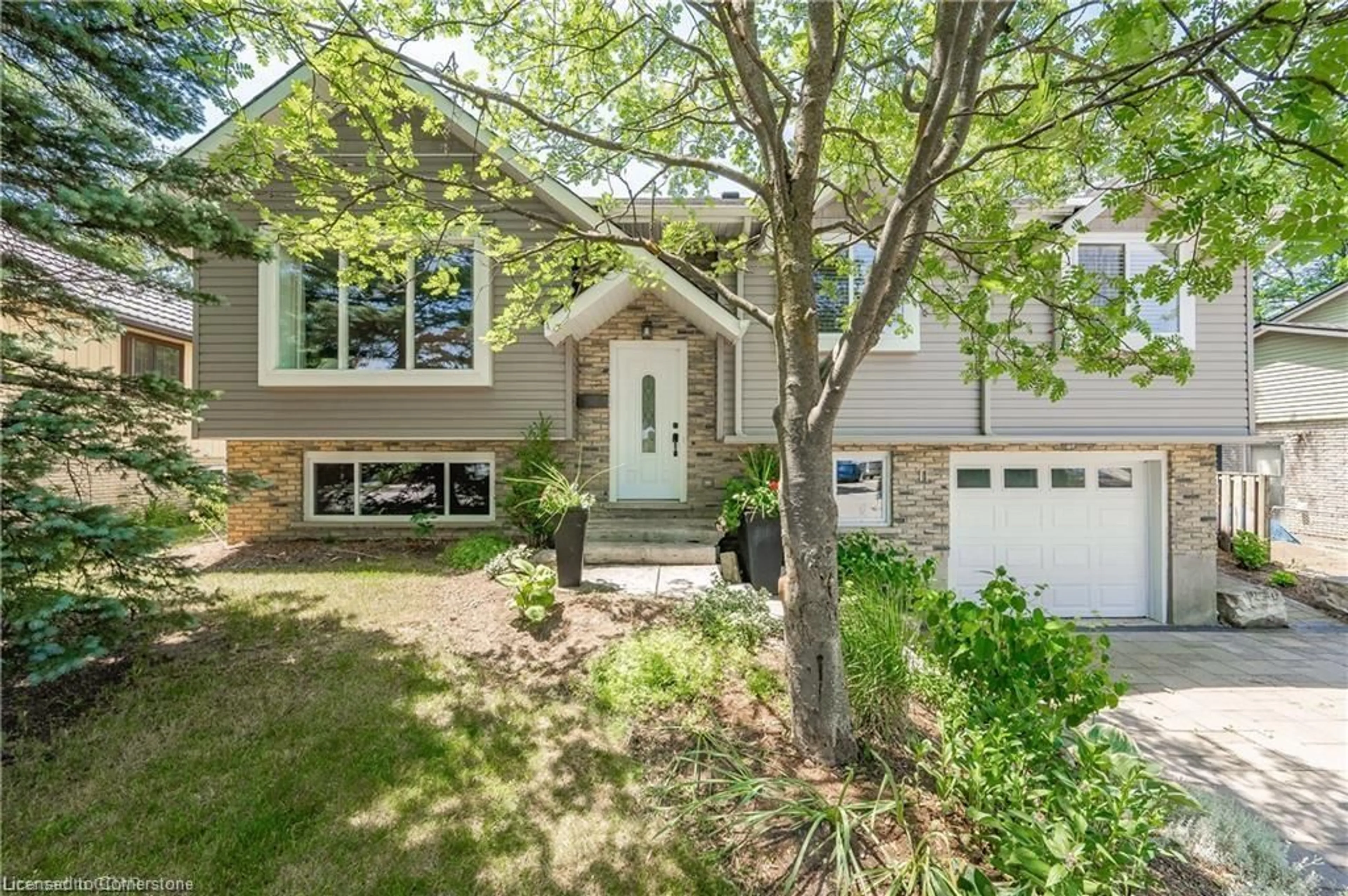 Home with vinyl exterior material, street for 11 Ferman Dr, Guelph Ontario N1H 7C8