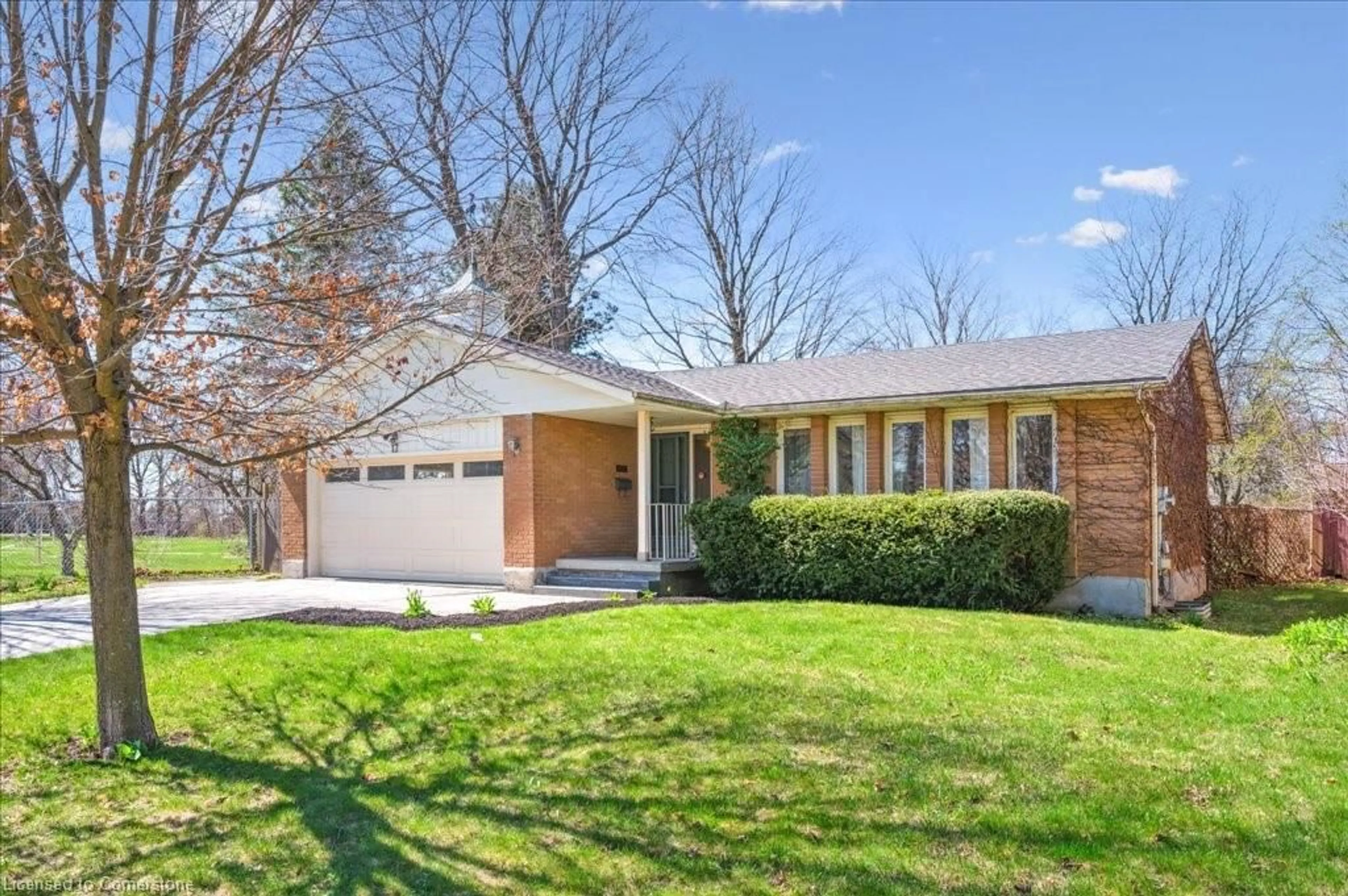 Home with brick exterior material, street for 17 Rickson Ave, Guelph Ontario N1G 2W9