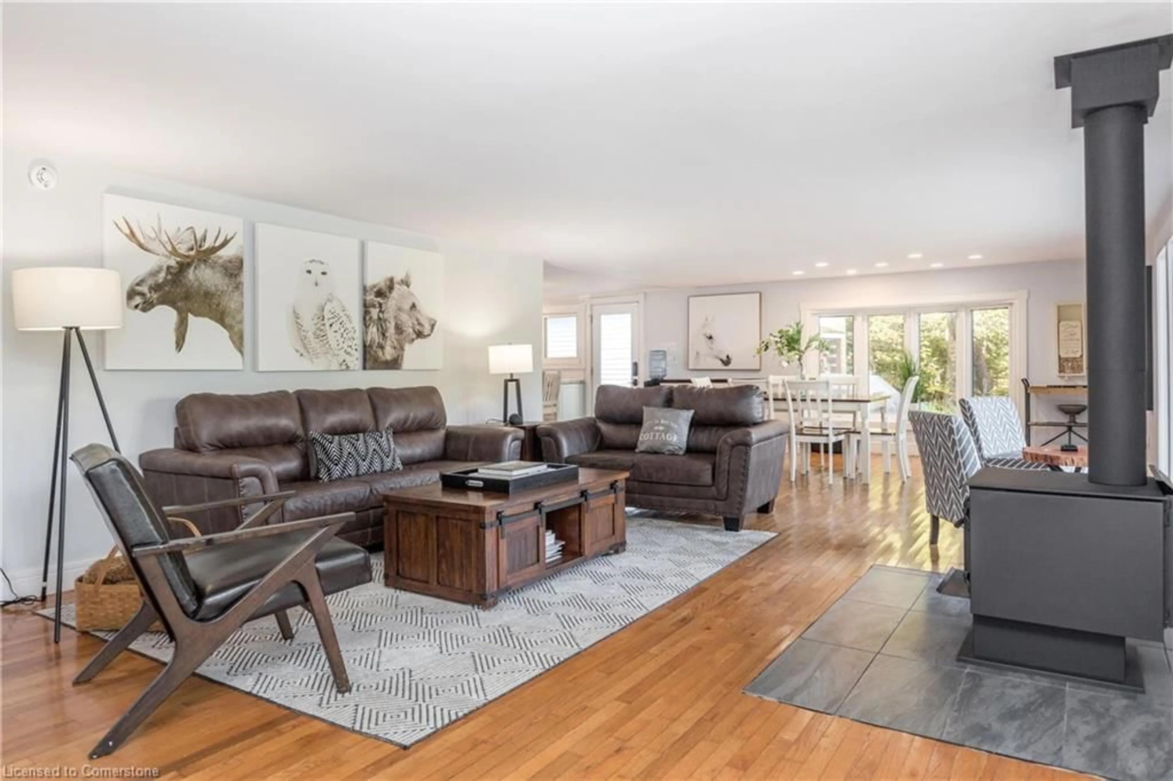 Living room with furniture, wood/laminate floor for 325 Balsam Chutes Rd, Port Sydney Ontario P0B 1L0