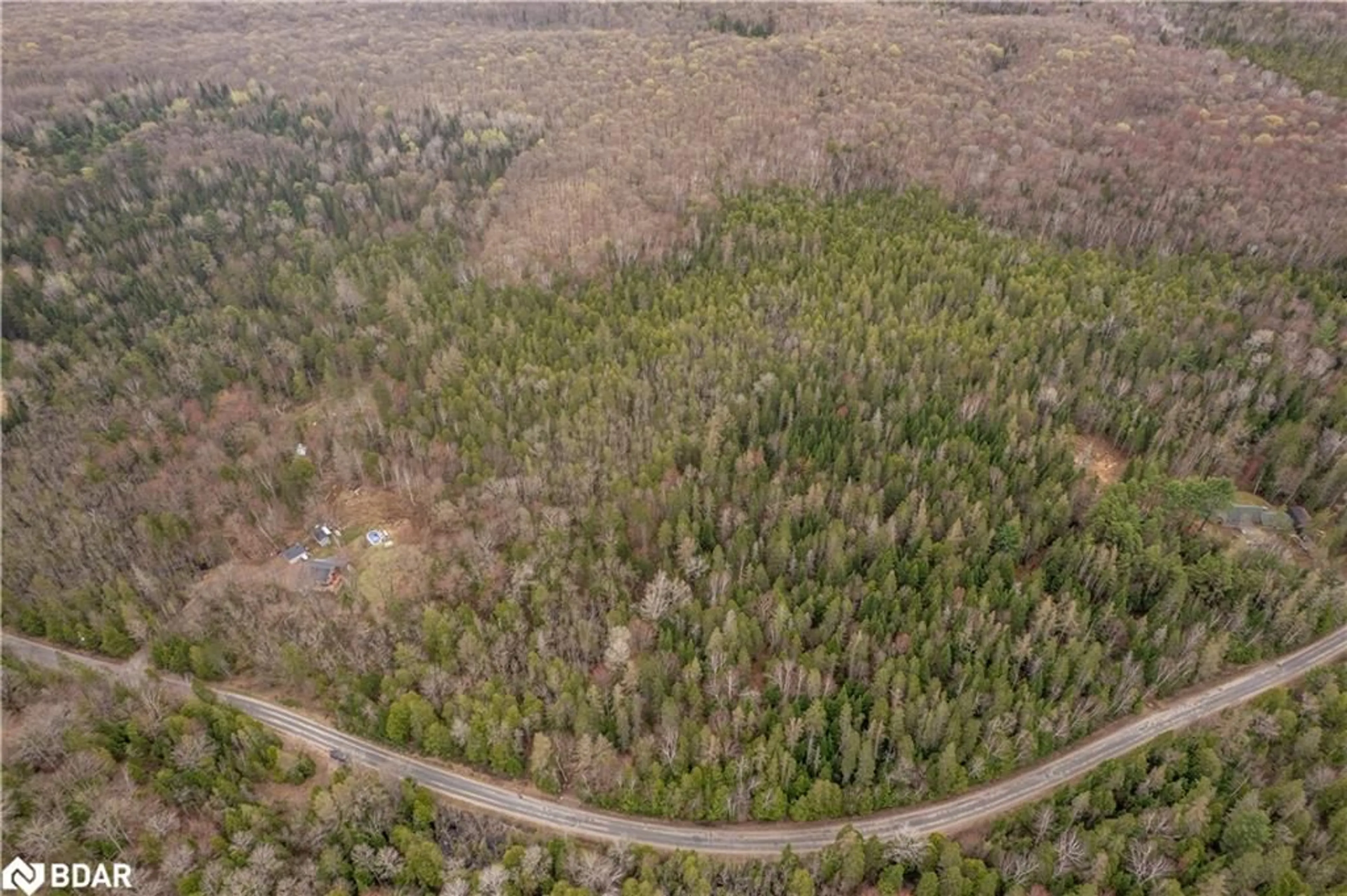 A pic from outside/outdoor area/front of a property/back of a property/a pic from drone, forest/trees view for 1272 Ursa Rd, Haliburton Ontario K0M 1R0