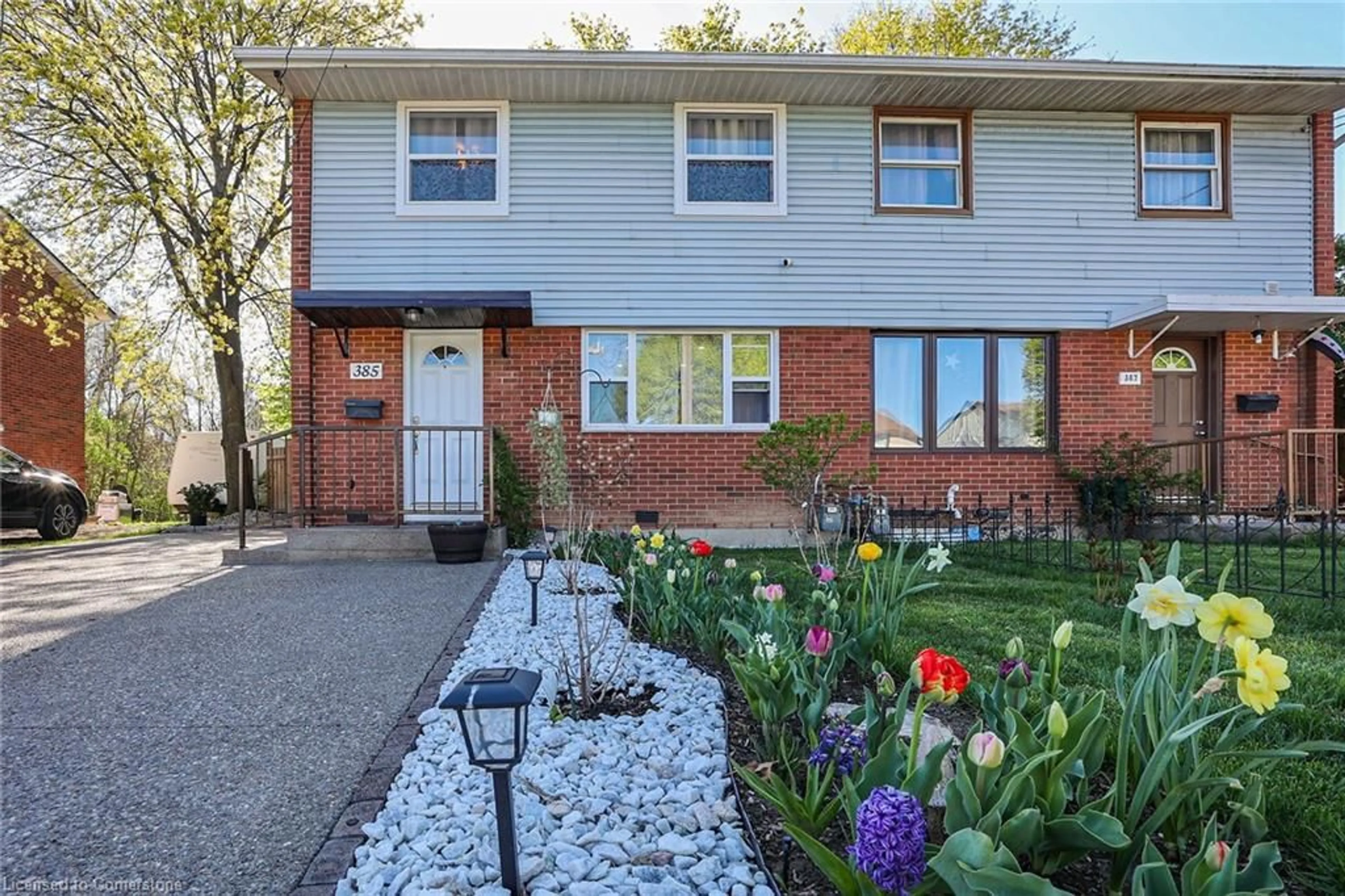 Home with brick exterior material, street for 385 East 23rd St, Hamilton Ontario L8V 2X5