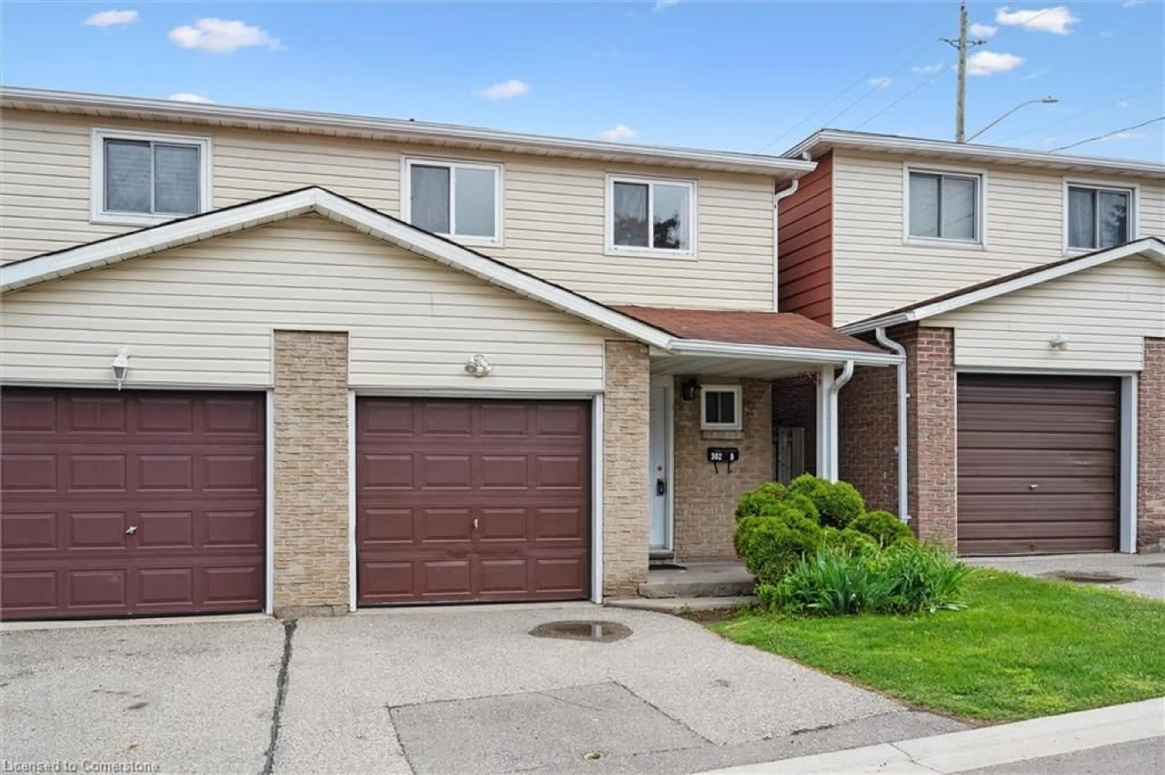 Home with brick exterior material, street for 302 Bluevale St #D, Waterloo Ontario N2J 4G3