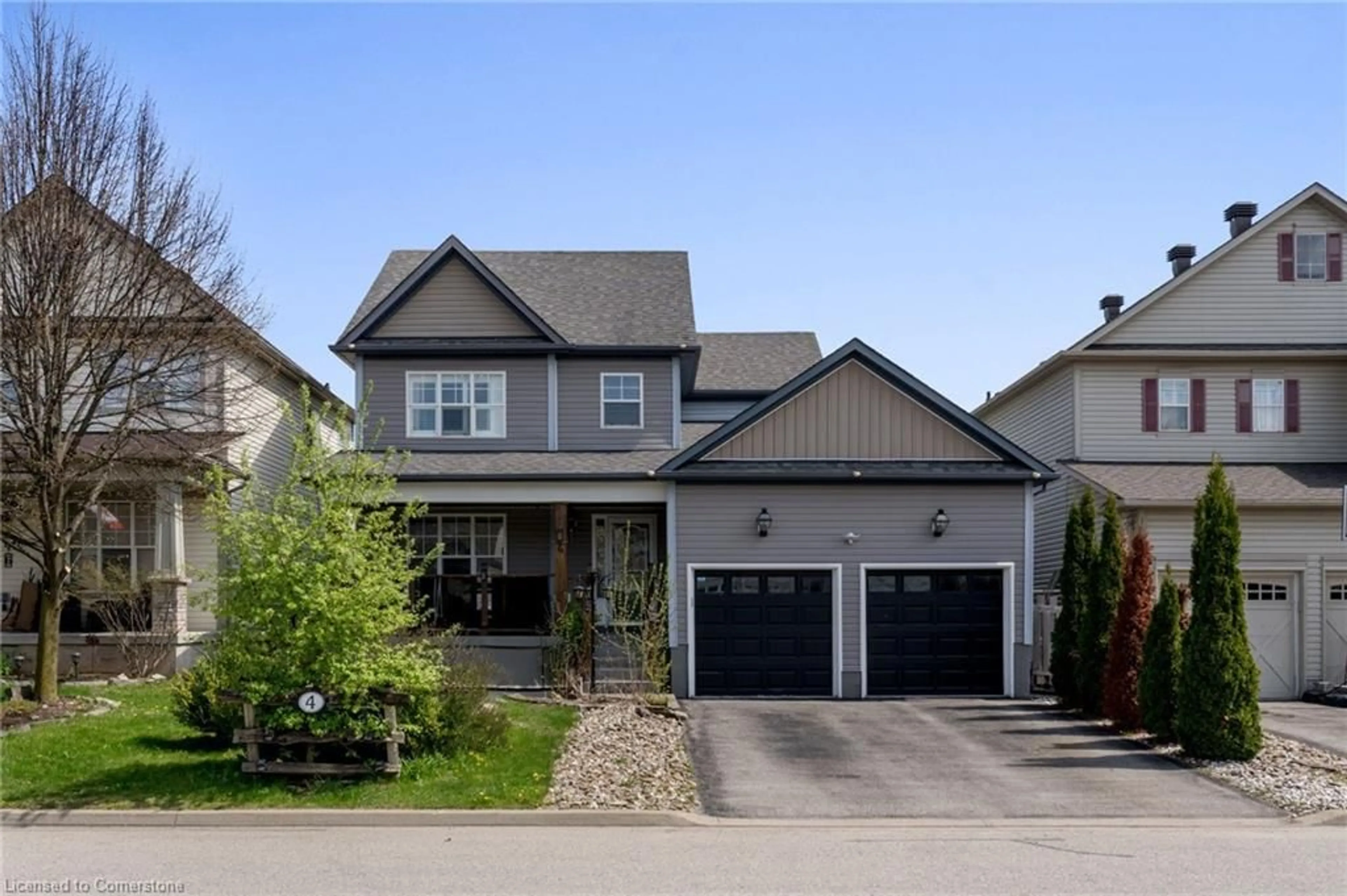 Home with vinyl exterior material, street for 4 Bonnette St, Acton Ontario L7J 2Z9