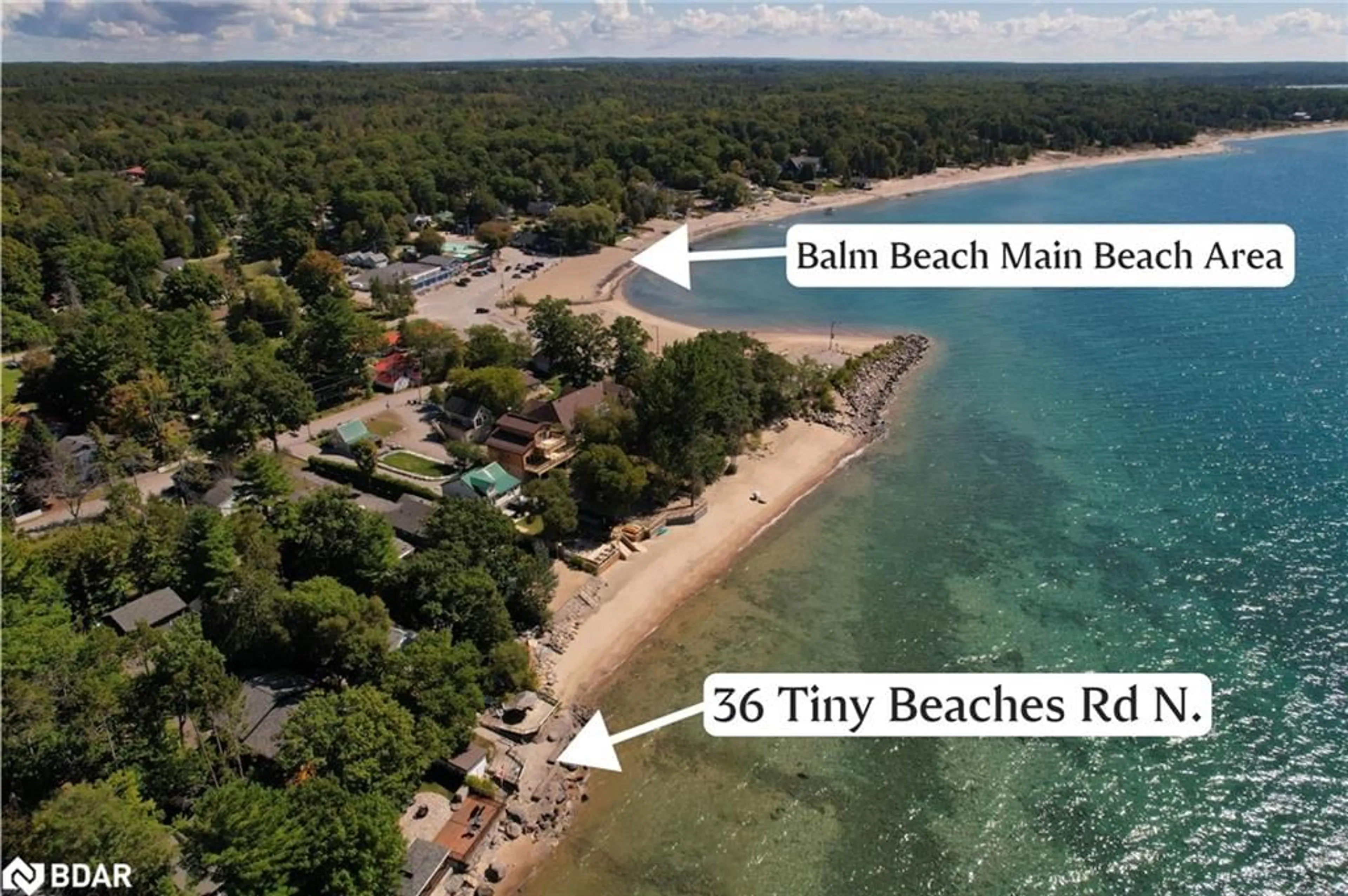 A pic from outside/outdoor area/front of a property/back of a property/a pic from drone, water/lake/river/ocean view for 36 Tiny Beaches Rd, Balm Beach Ontario L9M 1R3