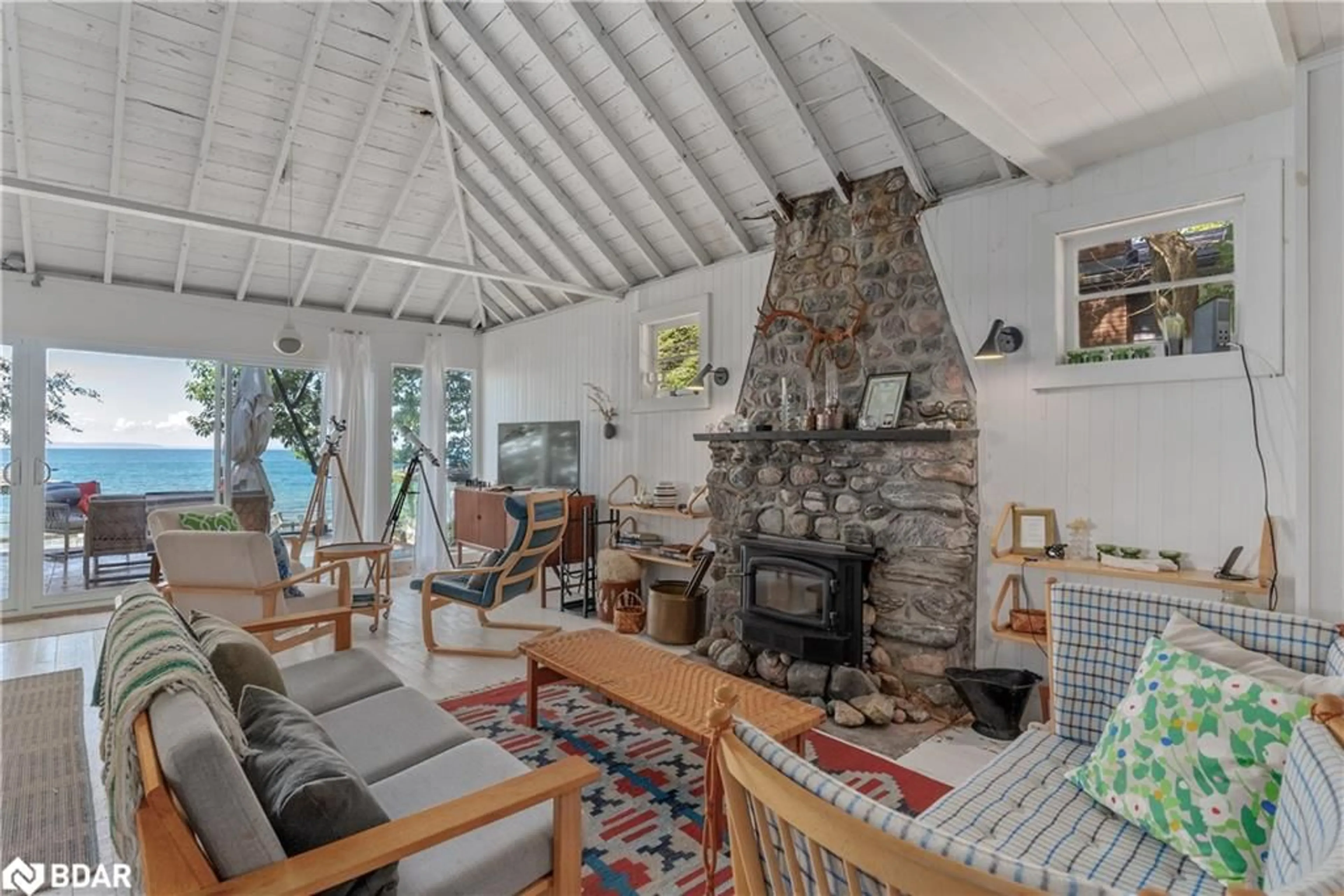 Living room with furniture, unknown for 36 Tiny Beaches Rd, Balm Beach Ontario L9M 1R3
