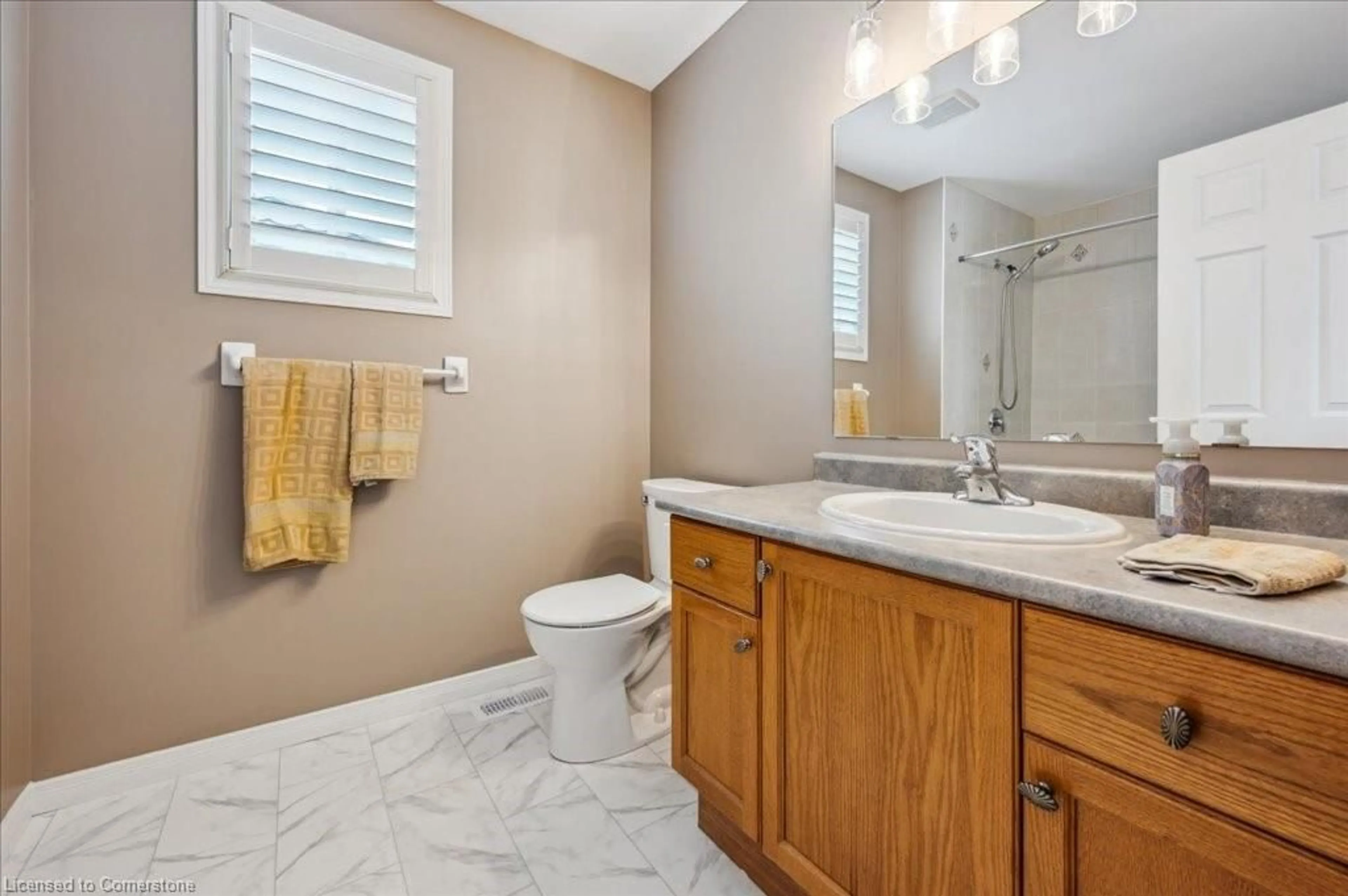 Standard bathroom, ceramic/tile floor for 519 Commonwealth Cres, Kitchener Ontario N2E 4K2