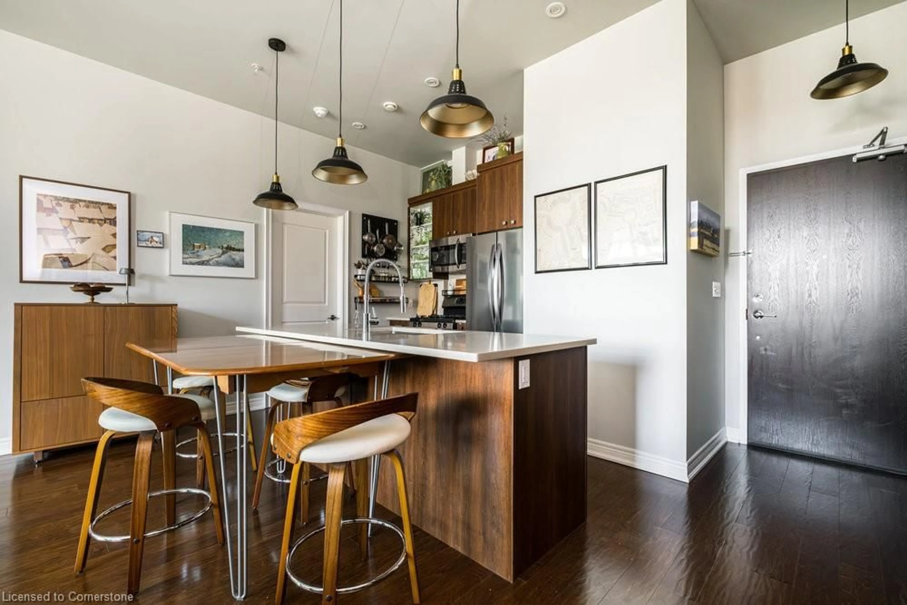 Open concept kitchen, wood/laminate floor for 50 Murray St #201, Hamilton Ontario L8L 1B3