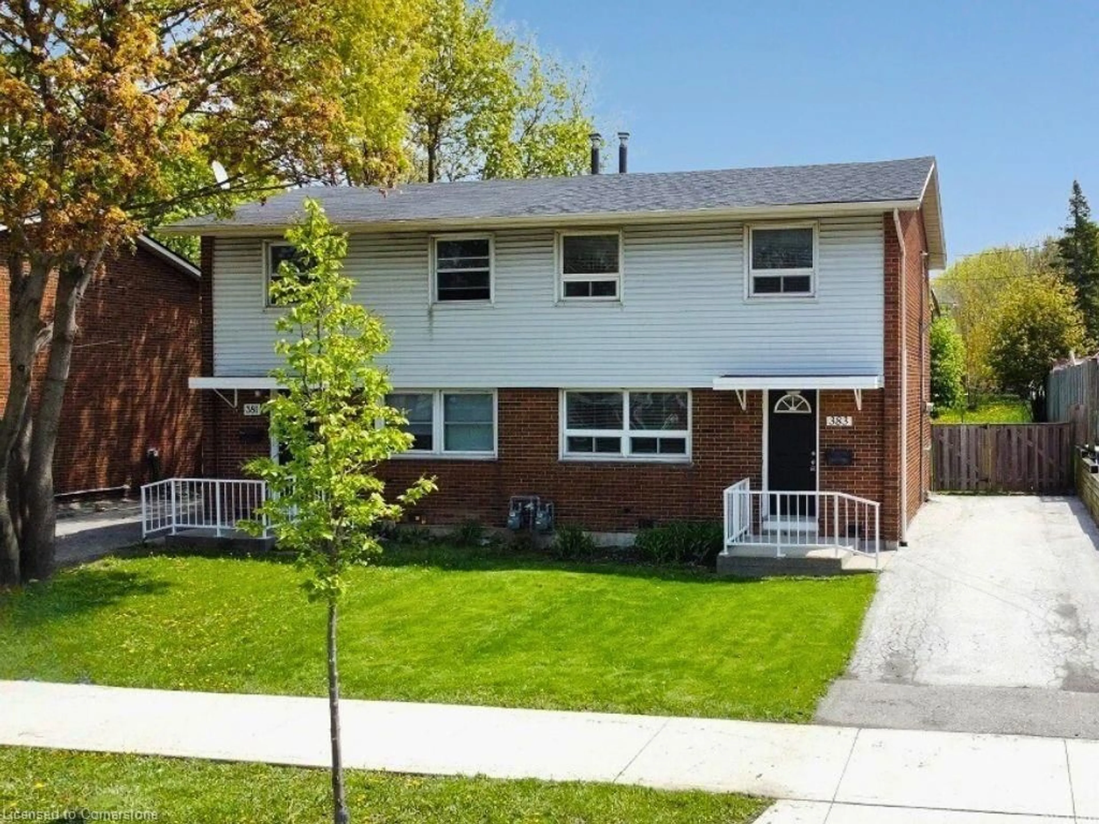 Home with brick exterior material, street for 383 East 22nd St, Hamilton Ontario L8V 2W3
