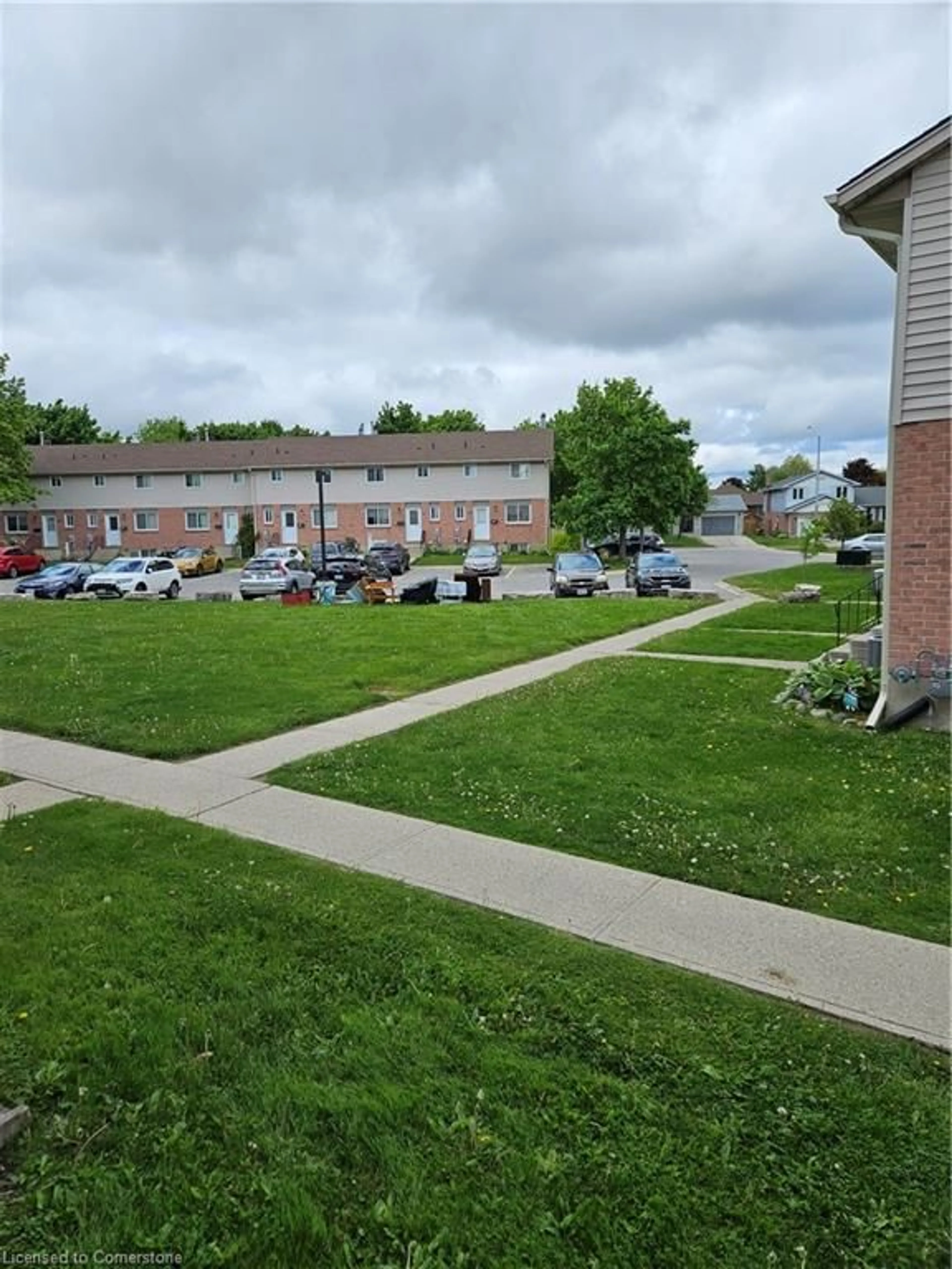 A pic from outside/outdoor area/front of a property/back of a property/a pic from drone, street for 485 Springbank Ave #23, Woodstock Ontario N4T 1R1