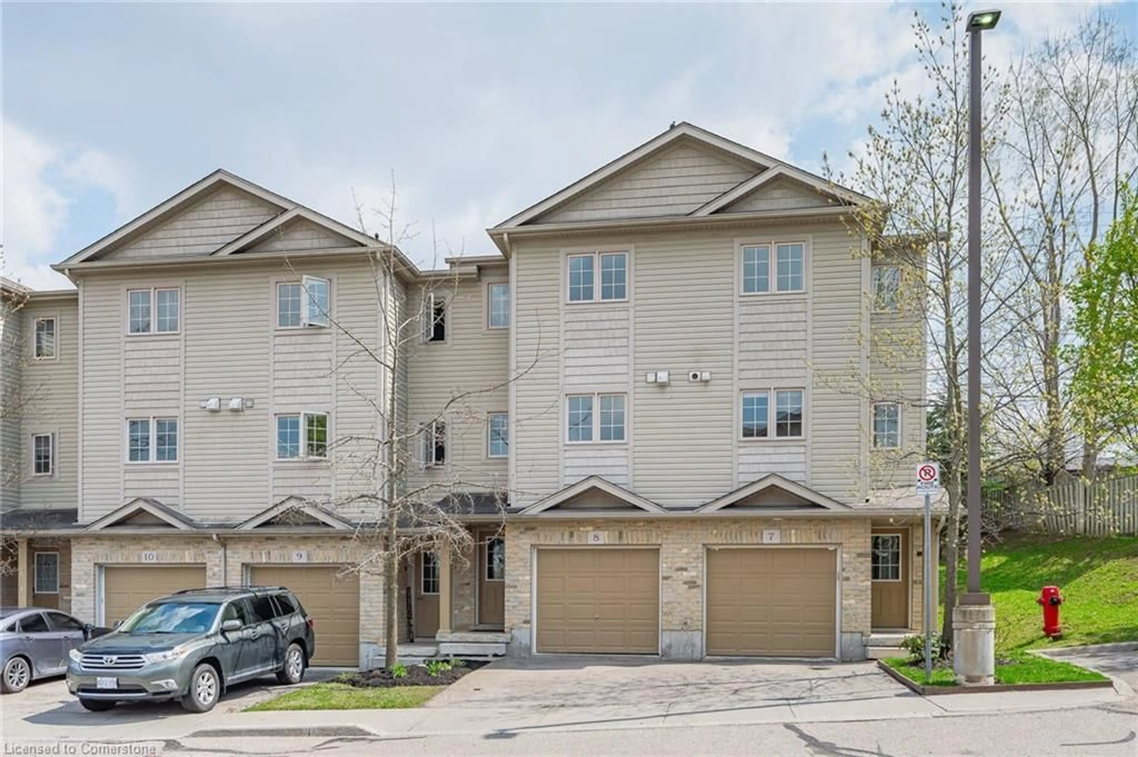 A pic from outside/outdoor area/front of a property/back of a property/a pic from drone, street for 155 Highland Cres #8, Kitchener Ontario N2M 0A1
