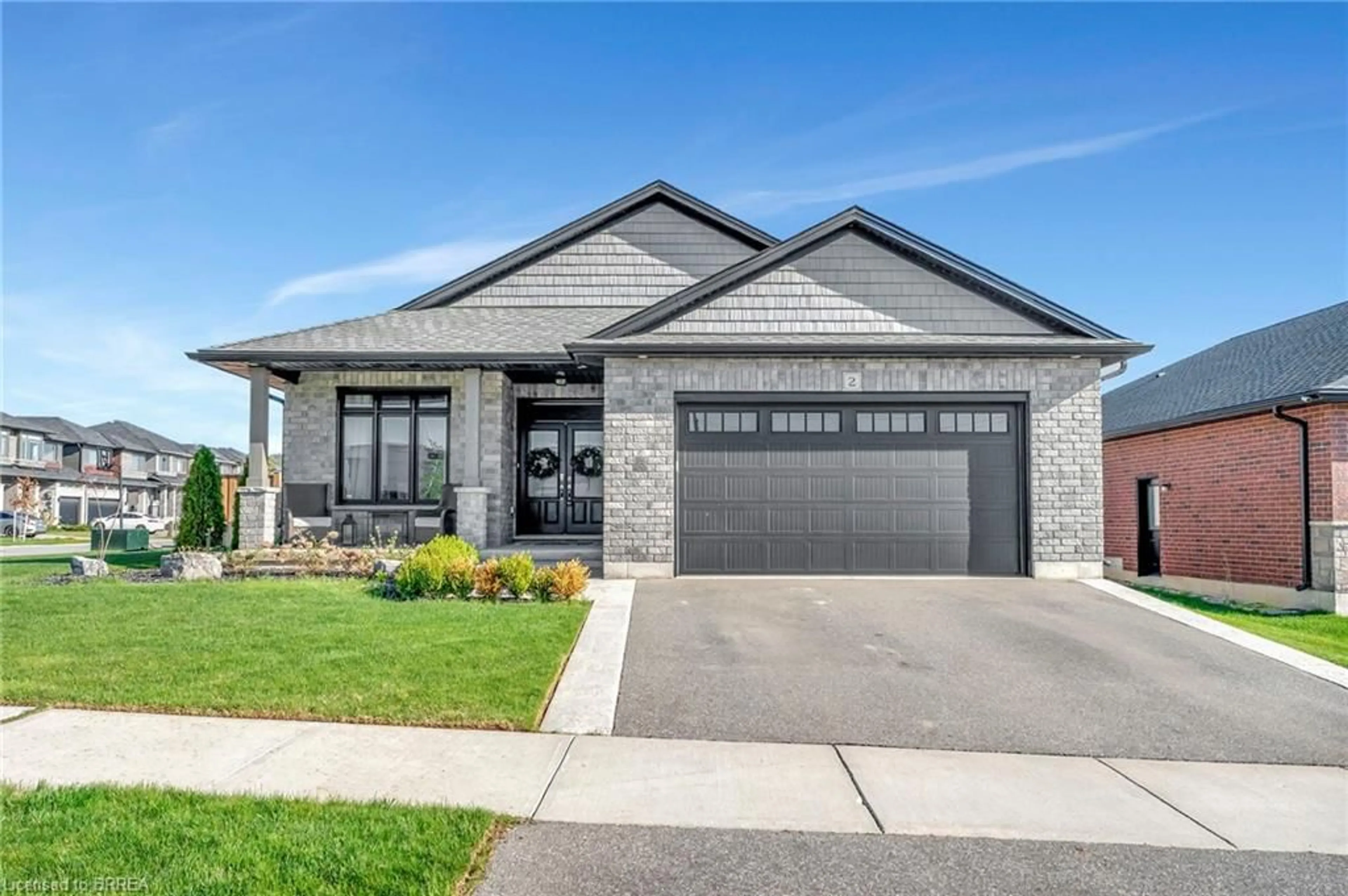 Home with brick exterior material, street for 2 Masters Lane, Paris Ontario N3L 0H4