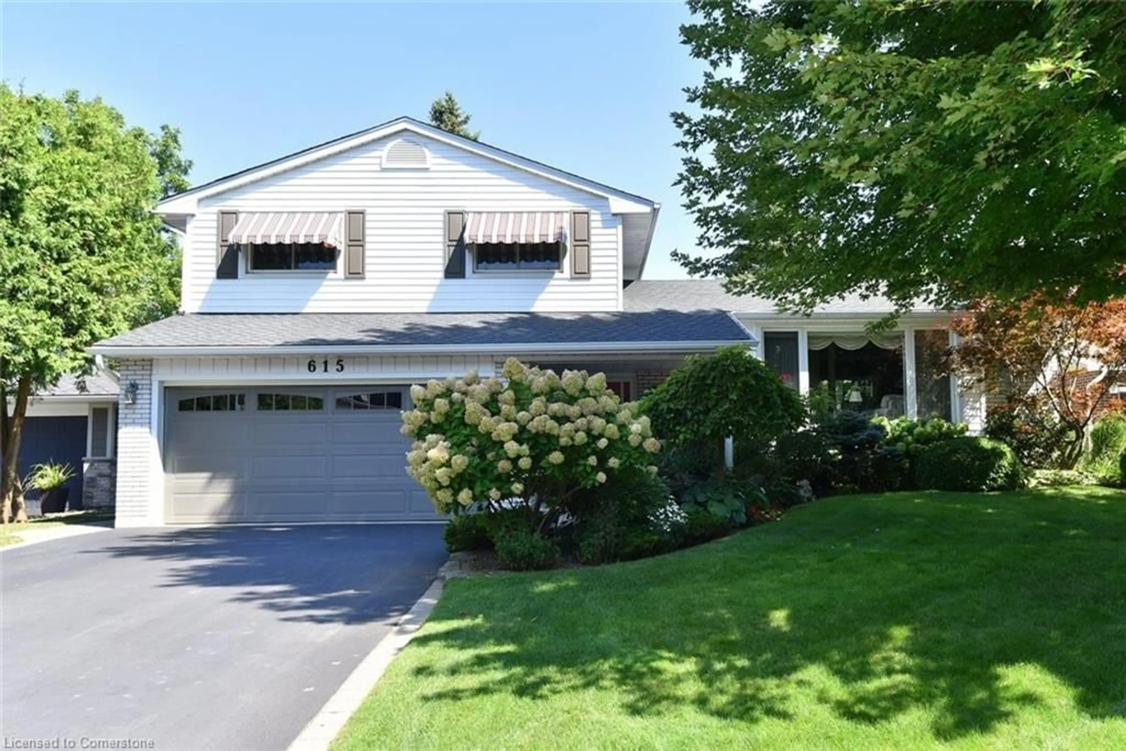 Home with vinyl exterior material, street for 615 Cherrywood Dr, Burlington Ontario L7T 3W9