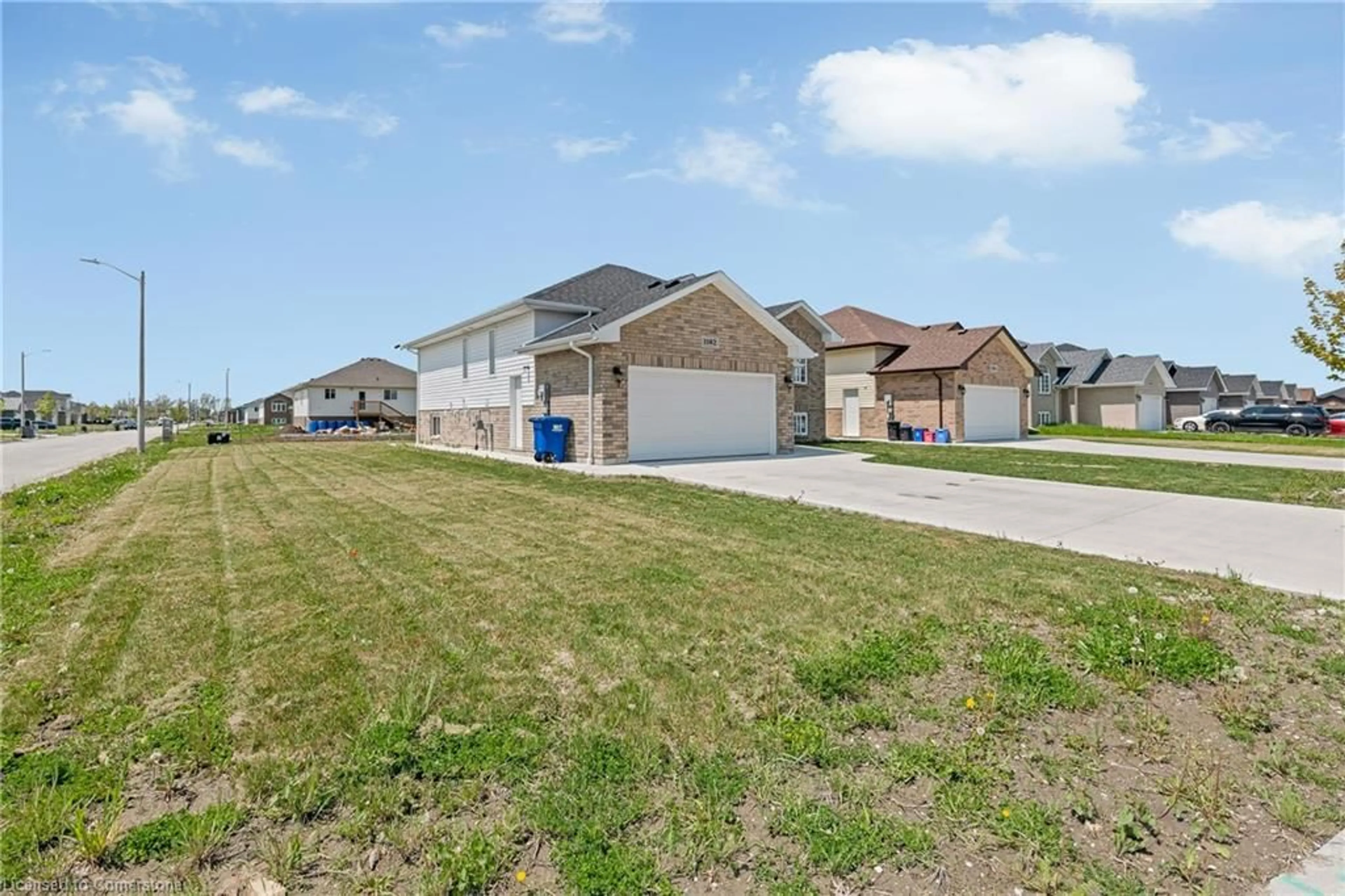A pic from outside/outdoor area/front of a property/back of a property/a pic from drone, street for 1102 Aspen Ridge Cres, Belle River Ontario N8L 1B2
