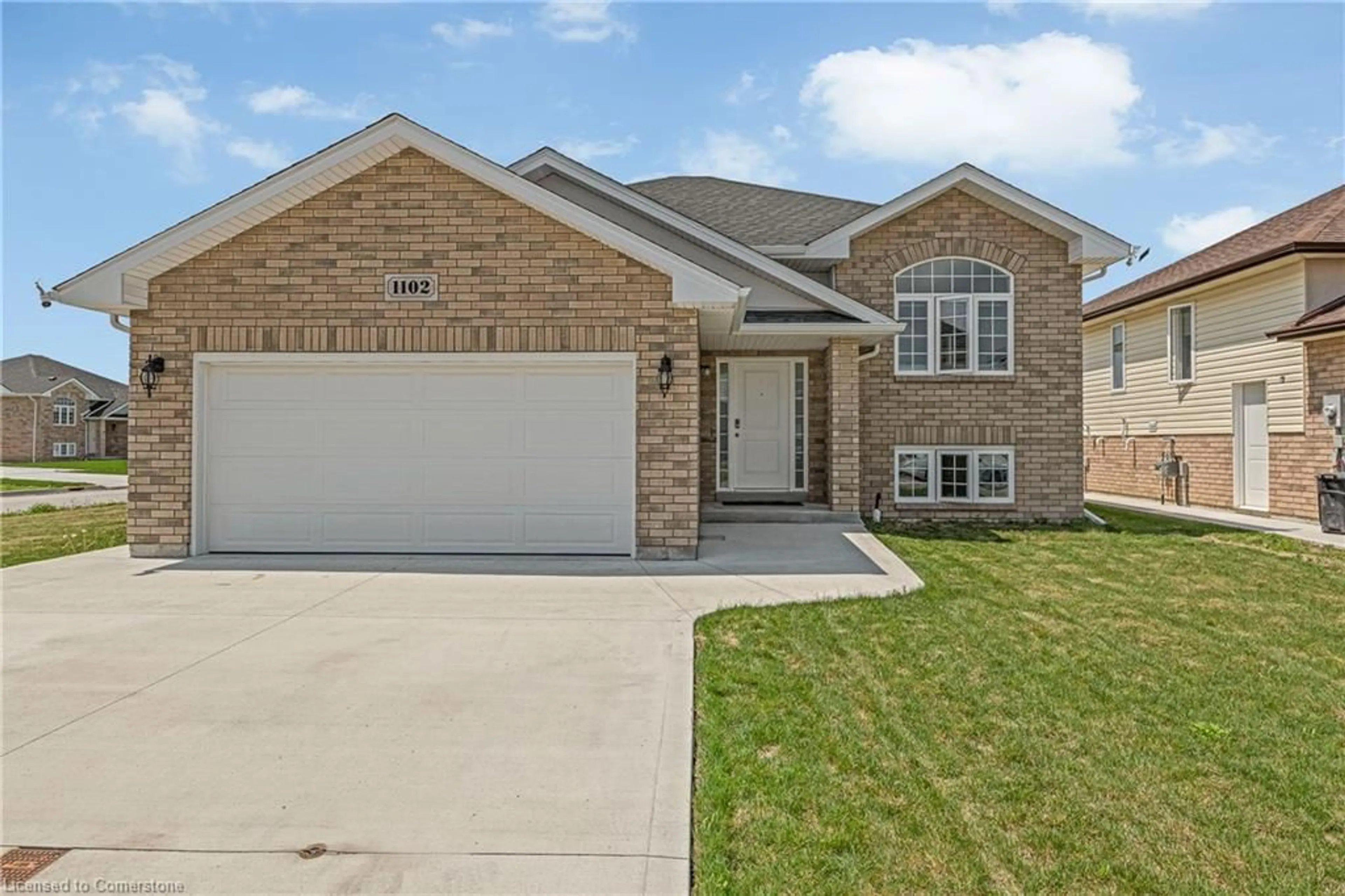 Home with brick exterior material, street for 1102 Aspen Ridge Cres, Belle River Ontario N8L 1B2