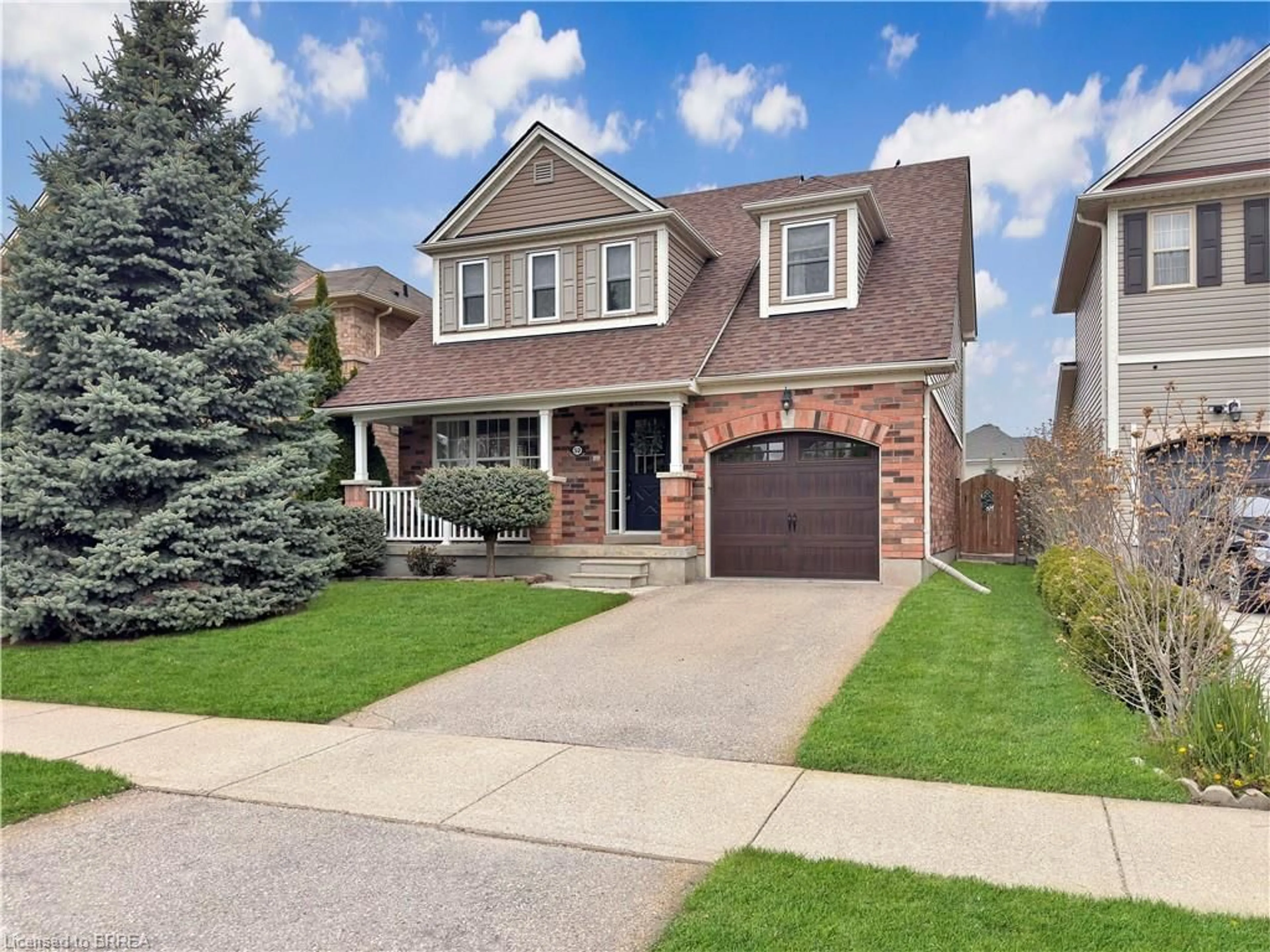 Home with brick exterior material, street for 52 Hollinrake Ave, Brantford Ontario N3T 0B6