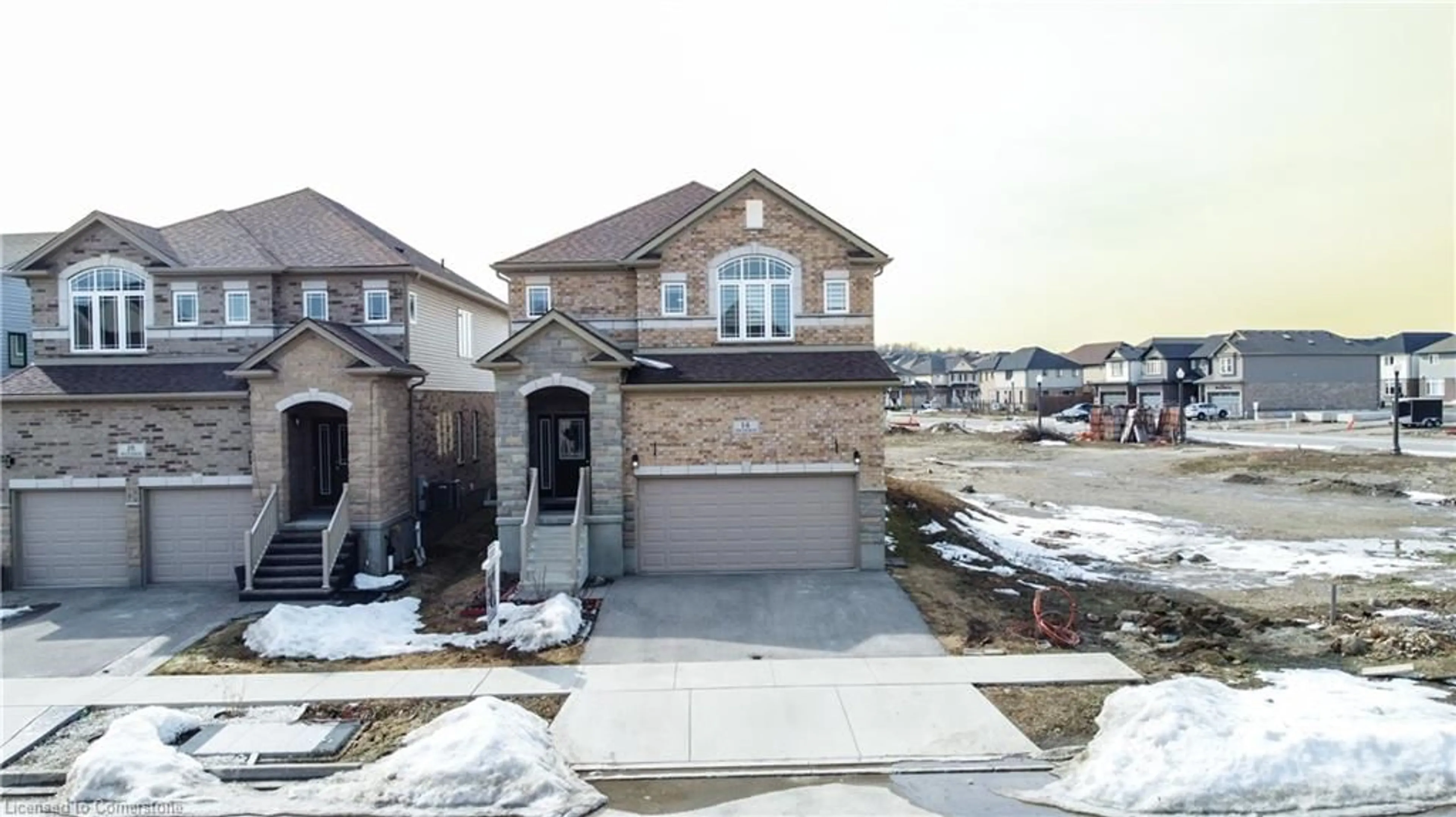 A pic from outside/outdoor area/front of a property/back of a property/a pic from drone, street for 14 Waterbow Trail, Kitchener Ontario N2A 0K7