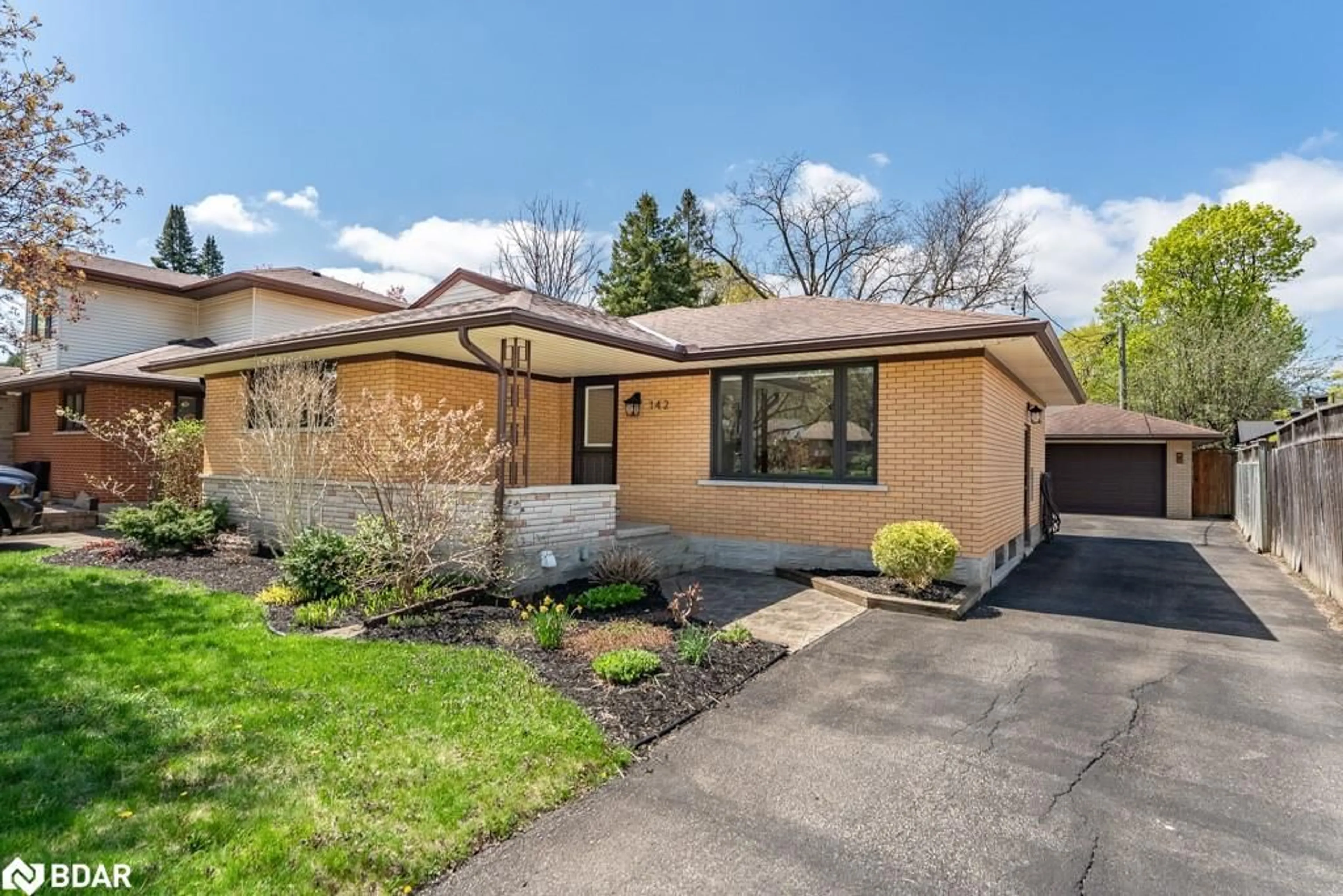 Home with brick exterior material, street for 142 Mackay Cres, Waterloo Ontario N2J 3K3