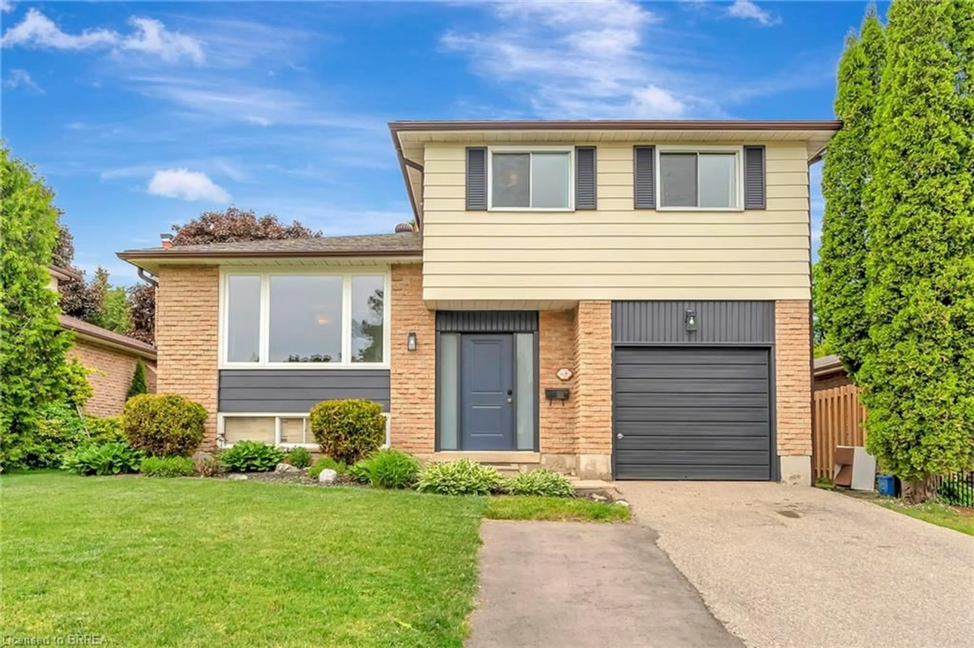 Home with brick exterior material, street for 25 Trillium Way, Paris Ontario N3L 3P9