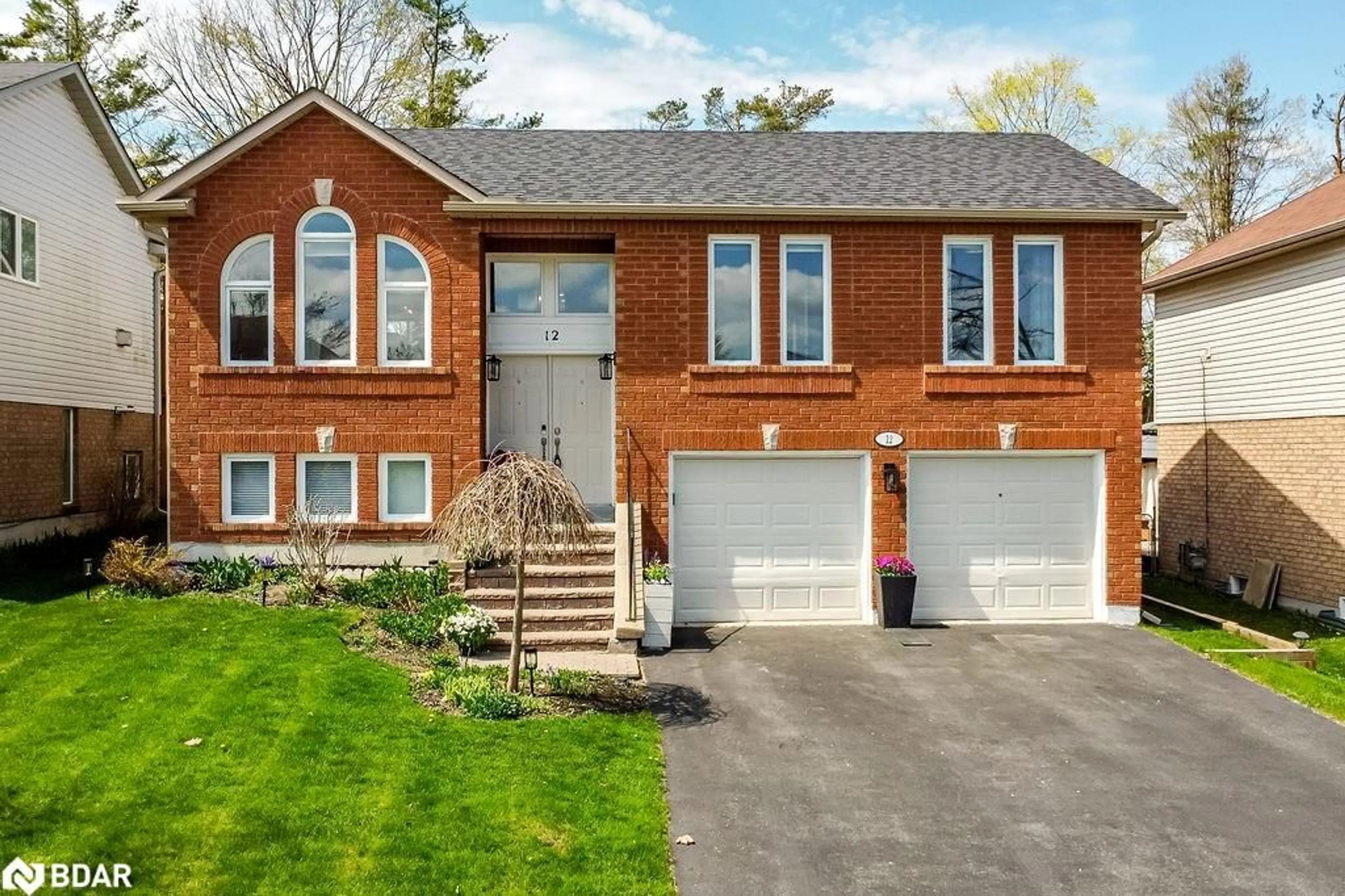 Home with brick exterior material, street for 12 Frontier Ave, Orillia Ontario L3V 7S8