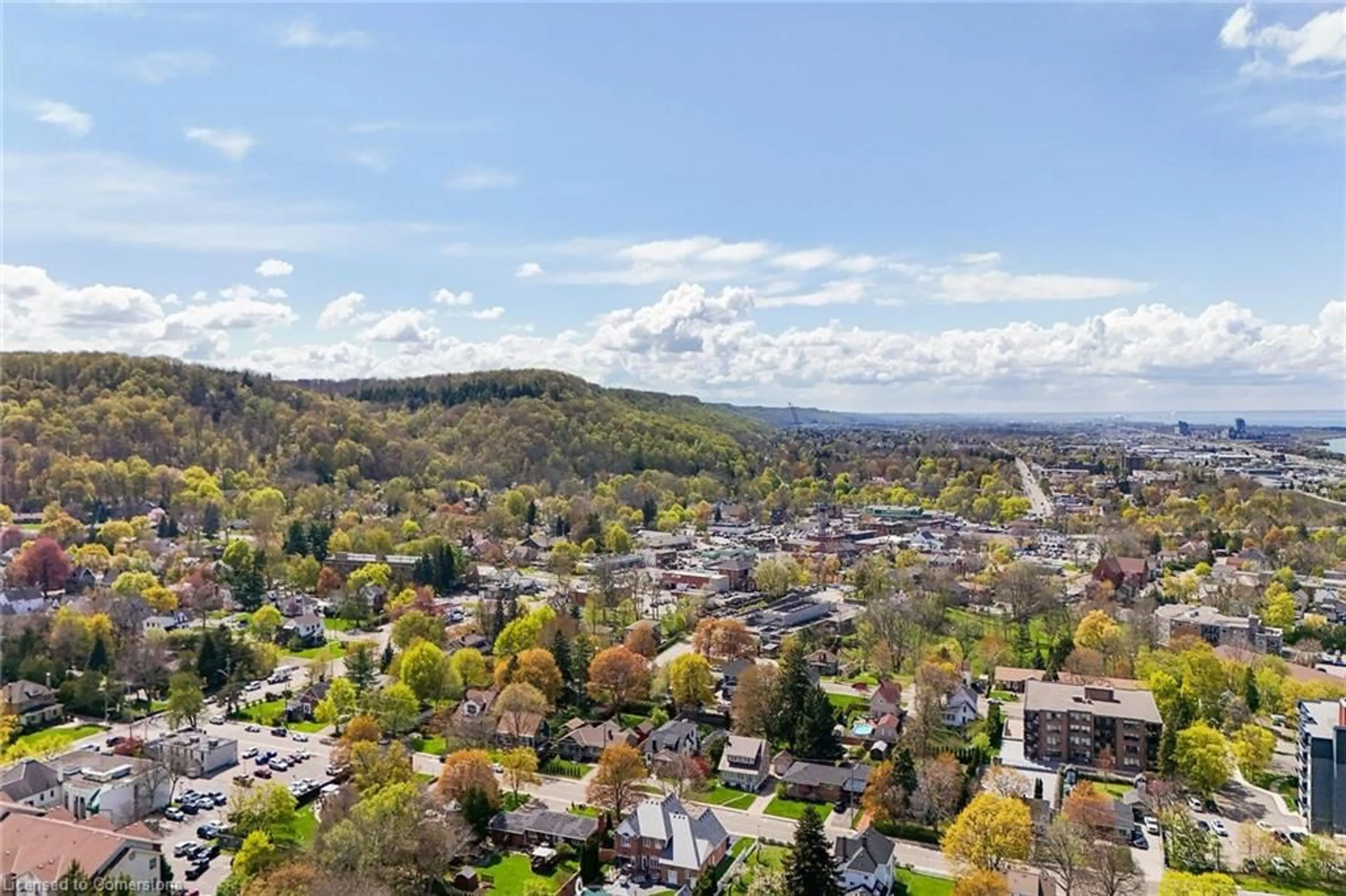 A pic from outside/outdoor area/front of a property/back of a property/a pic from drone, mountain view for 91 Main St #11, Grimsby Ontario L3M 1N6