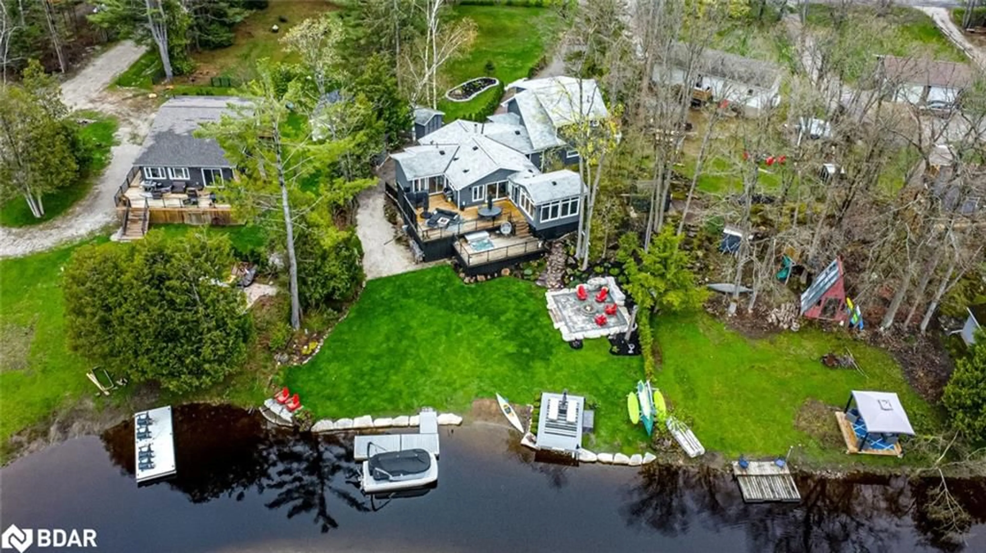 A pic from outside/outdoor area/front of a property/back of a property/a pic from drone, street for 7952 Park Lane Crescent, Ramara Ontario L0K 2B0