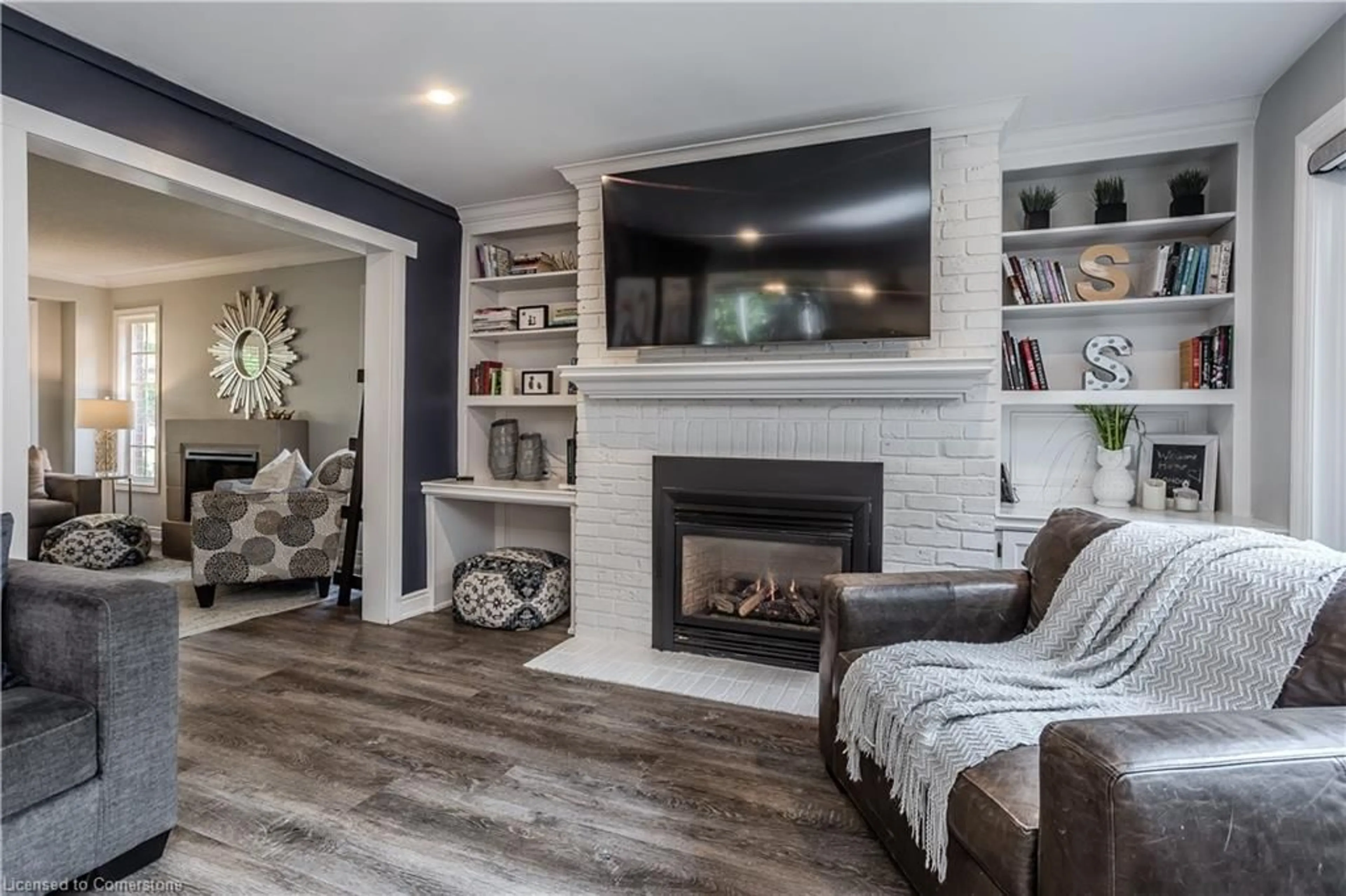 Living room with furniture, wood/laminate floor for 656 Andrea Crt, Burlington Ontario L7R 4J7
