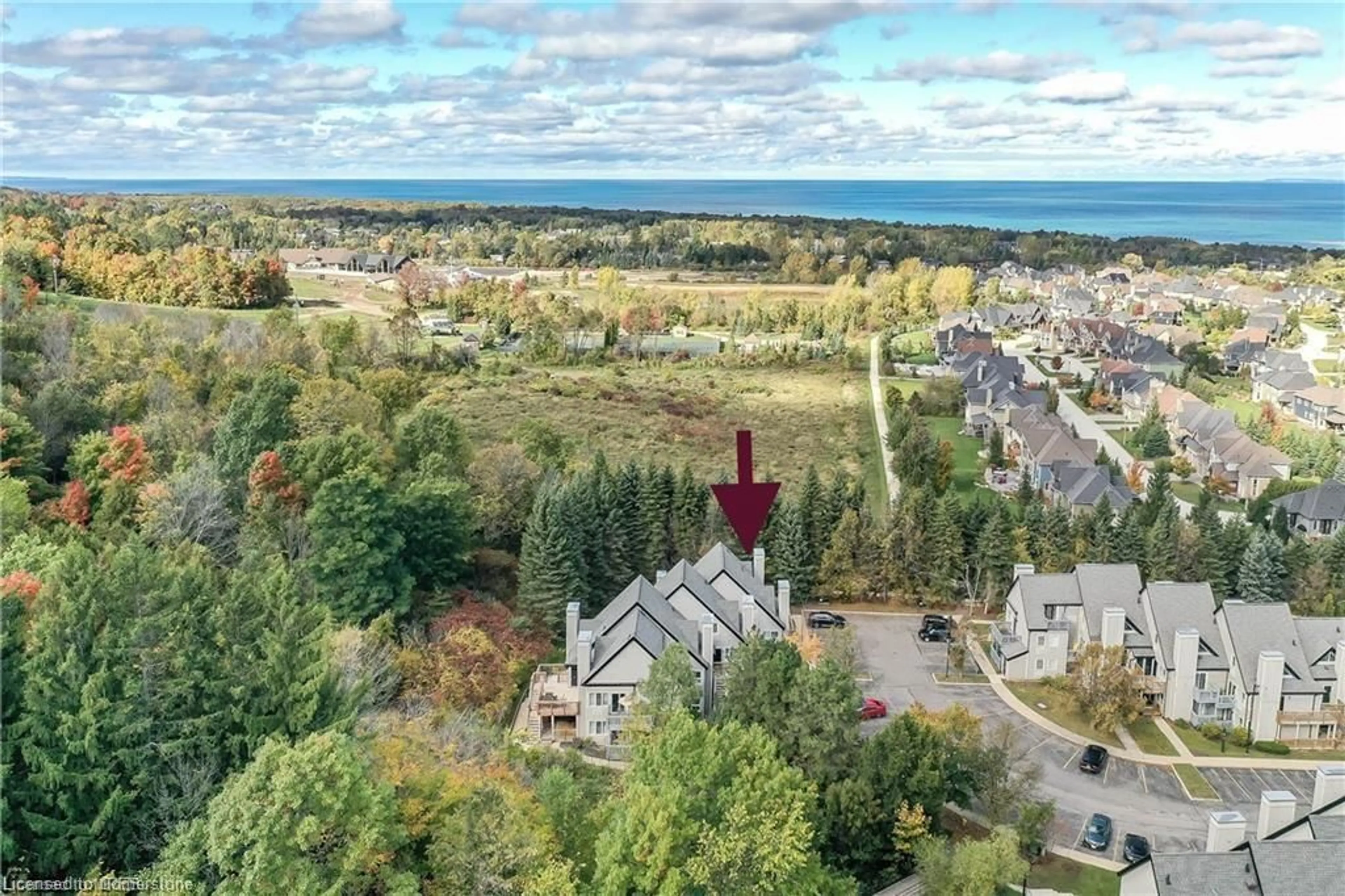 A pic from outside/outdoor area/front of a property/back of a property/a pic from drone, unknown for 796468 Grey 19 Rd #909, The Blue Mountains Ontario L9Y 0N6